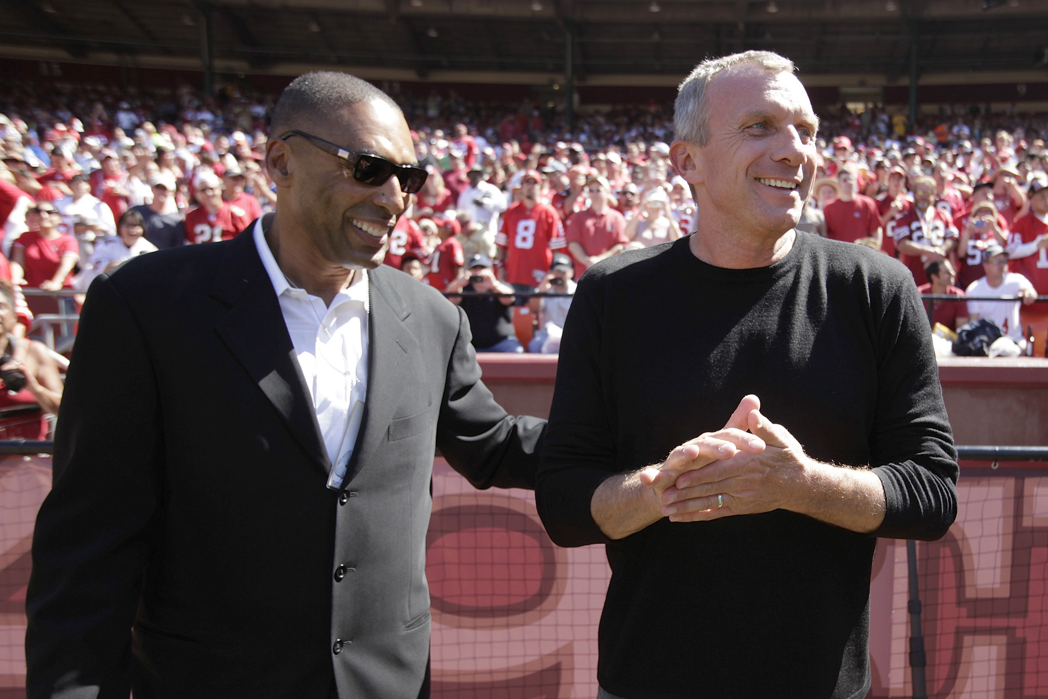 SAN FRANCISCO - SEPTEMBER 20:  Former 49ers Roger Craig (L) and Joe Montana wait to go out onto the field for a half time presentation during home opener as the San Francisco 49ers host the Seattle Seahawks at Candlestick Park September 20, 2009 in San Fr