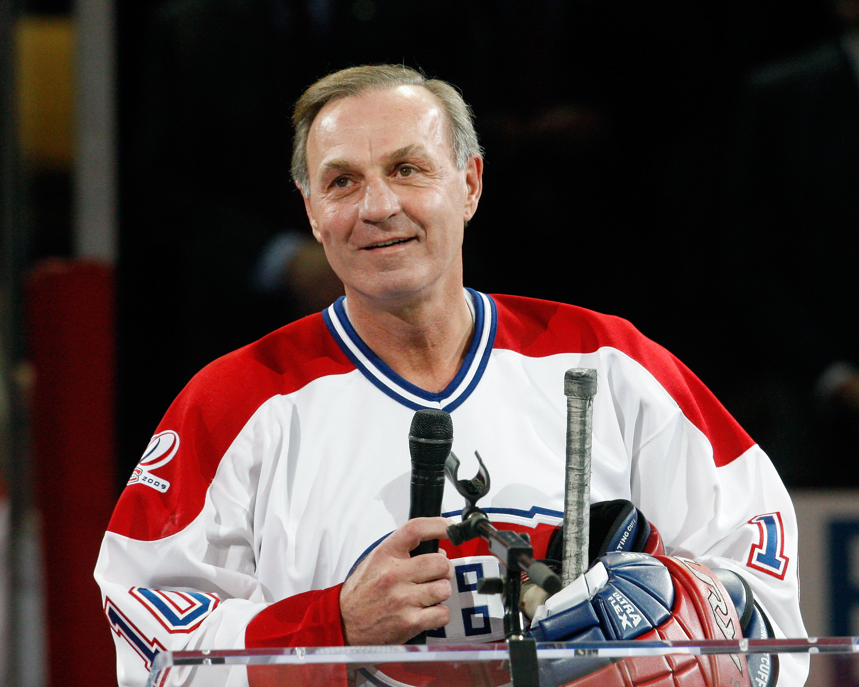 MONTREAL- DECEMBER 4:  Former Montreal Canadien Guy Lafleur speaks to fans during the Centennial Celebration ceremonies prior to the NHL game between the Montreal Canadiens and Boston Bruins on December 4, 2009 at the Bell Centre in Montreal, Quebec, Cana