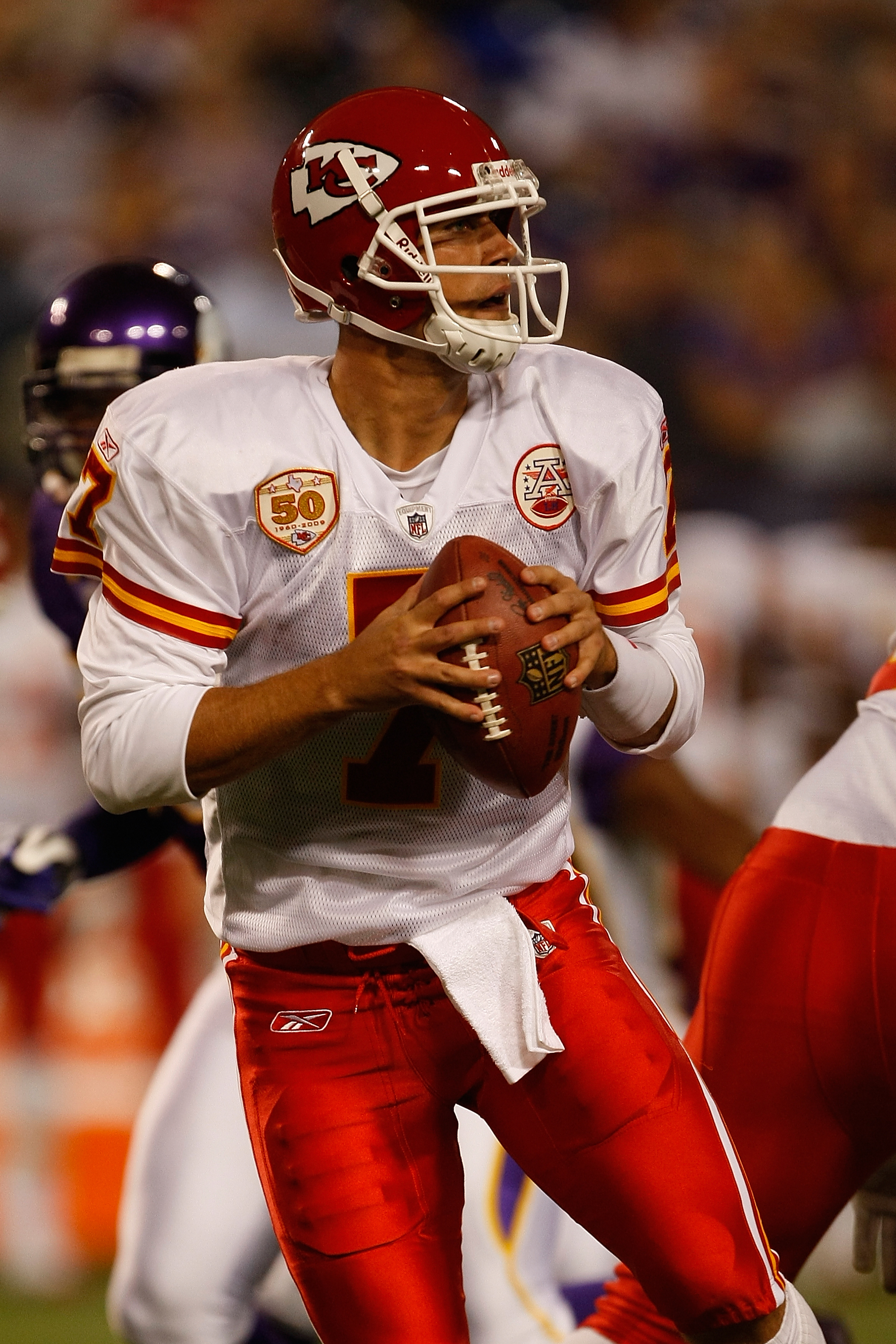 Kansas City Chiefs quarterback Matt Cassel loses the ball while being  sacked by San Diego Chargers Jarret Johnson in his own end zone during the  second half of an NFL football game