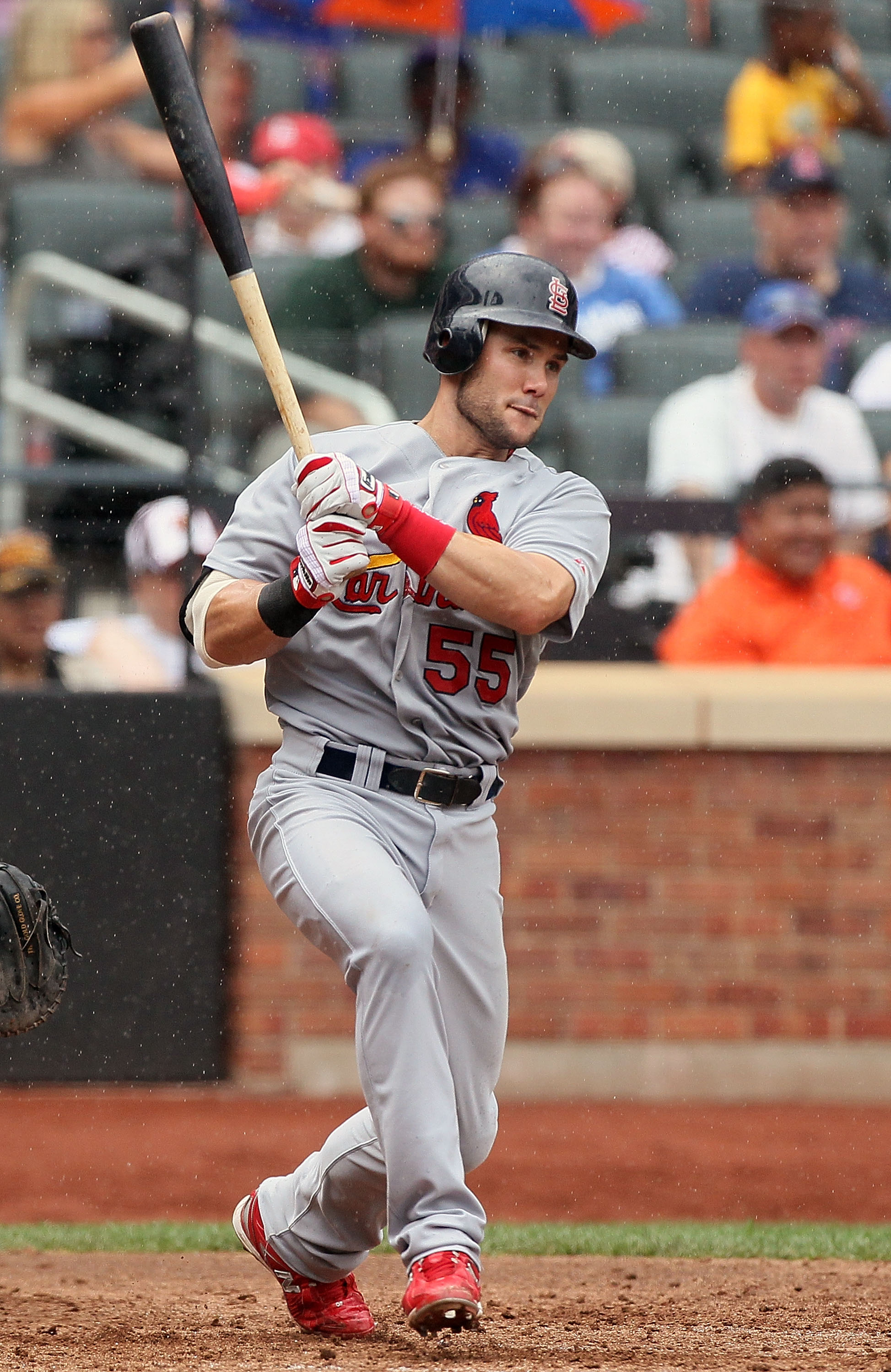 NEW YORK - JULY 29:  Skip Schumaker #55 of the St. Louis Cardinals follows through on a eighth inning single against the New York Mets on July 29, 2010 at Citi Field in the Flushing neighborhood of the Queens borough of New York City. The Mets defeated th