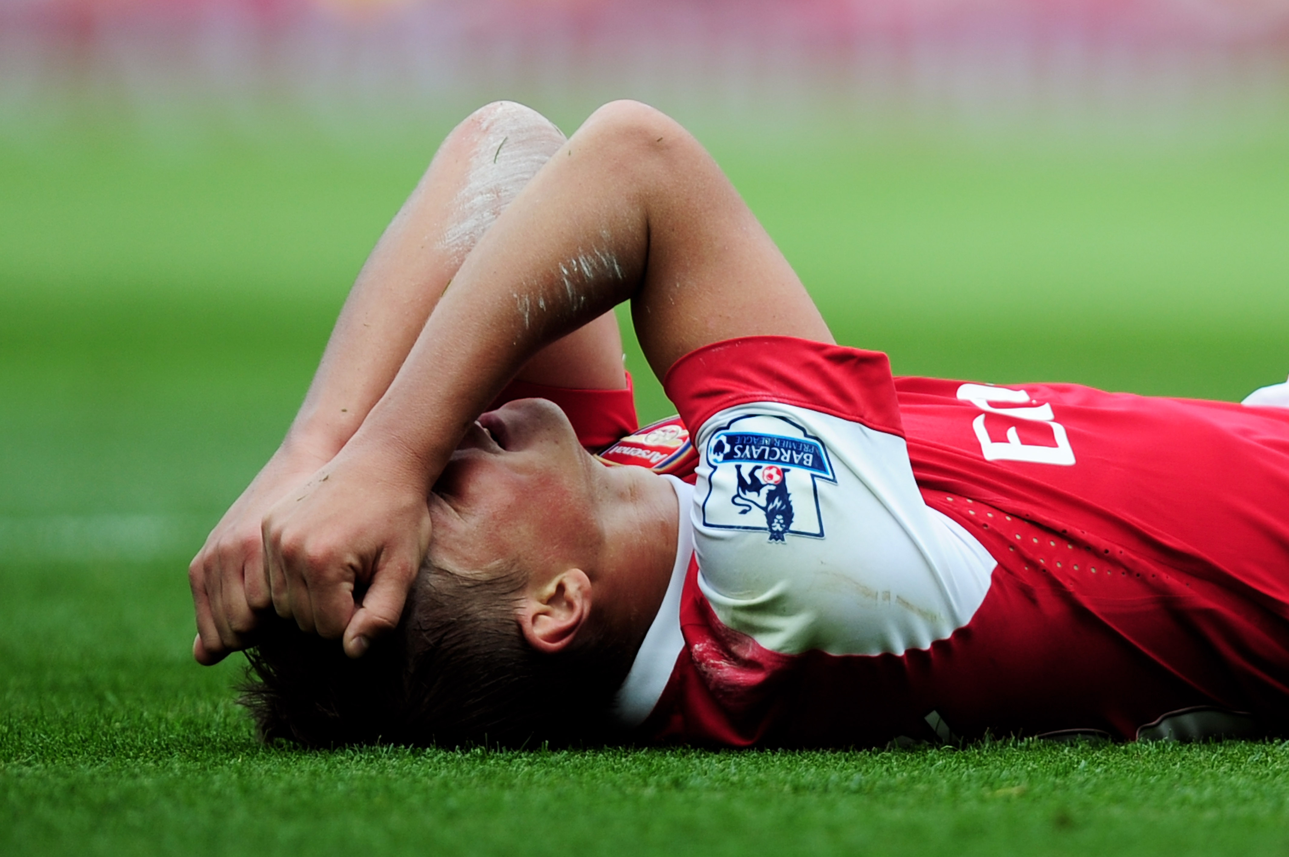 LONDON, ENGLAND - SEPTEMBER 11:  Andrei Arshavin of Arsenal holds his head after a missed chance during the Barclays Premier League match between Arsenal and Bolton Wanderers at The Emirates Stadium on September 11, 2010 in London, England.  (Photo by Jam