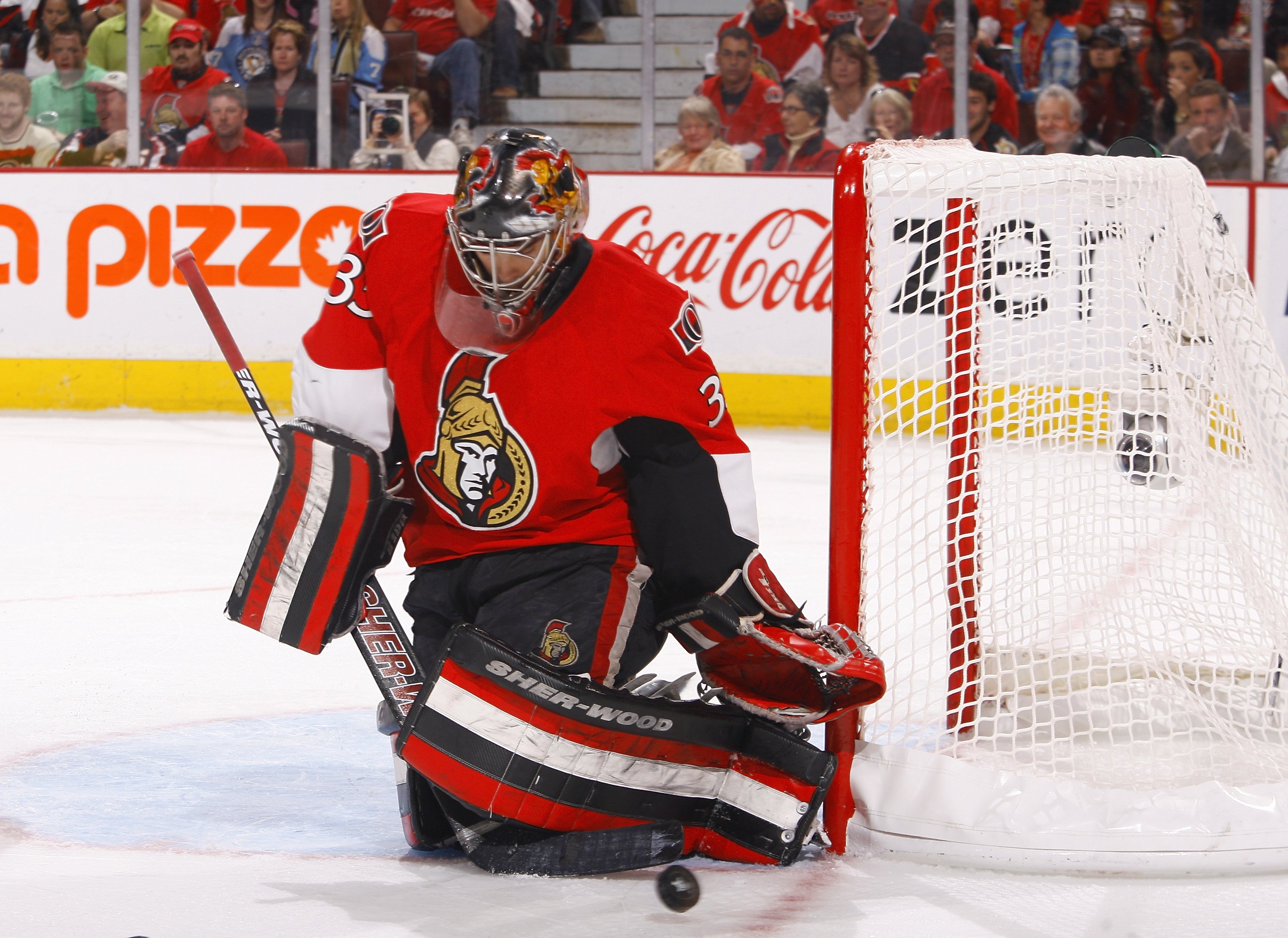 OTTAWA, ON - APRIL 24: Goaltender Pascal Leclaire #33 of the Ottawa Senators makes a pad save against the Pittsburgh Penguins in Game 6 of the Eastern Conference Quaterfinals during the 2010 Stanley Cup Playoffs at Scotiabank Place on April 24, 2010 in O