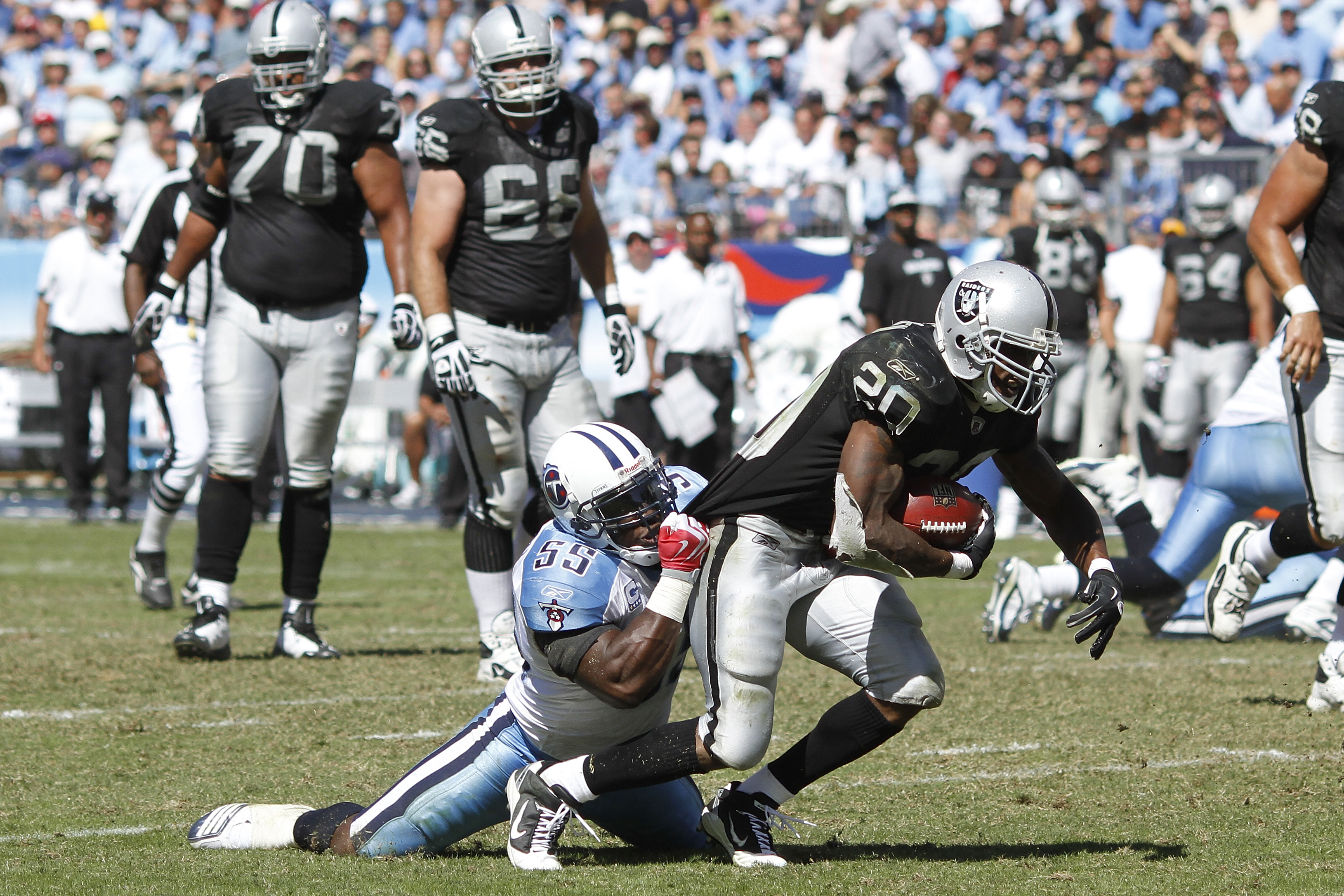 Oakland Raiders running back Darren McFadden (20) dives over the goal line  for a touchdown that was called back due to a penalty during the first half  of an NFL football game