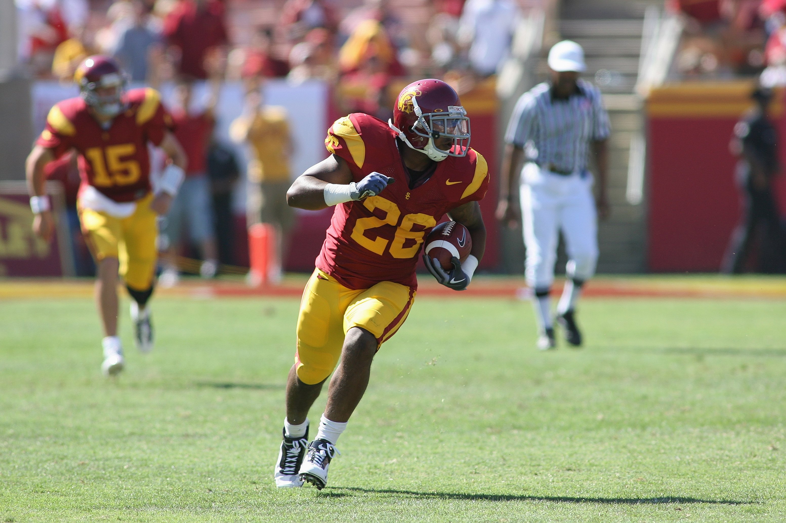 LOS ANGELES, CA - SEPTEMBER 5: Running back Marc Tyler #26 of the USC Trojans carries the ball against the San Jose State Spartans on September 5, 2009 at the Los Angeles Memorial Coliseum in Los Angeles, California. USC won 56-3. (Photo by Jeff Golden