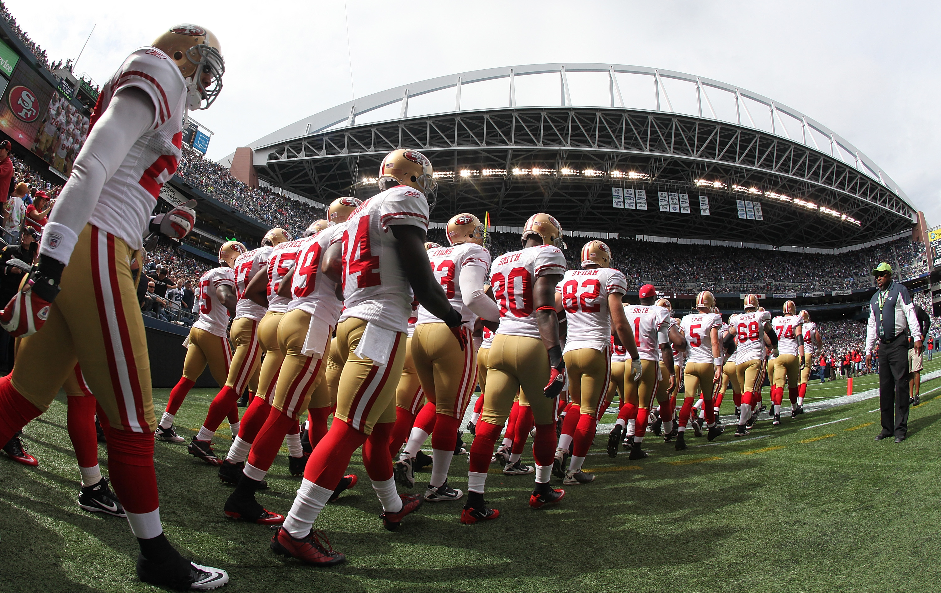 SEATTLE - SEPTEMBER 12:  Members of the San Francisco 49ers take the field prior to the NFL season opener against the Seattle Seahawks at Qwest Field on September 12, 2010 in Seattle, Washington. The Seahawks defeated the 49ers 31-6. (Photo by Otto Greule