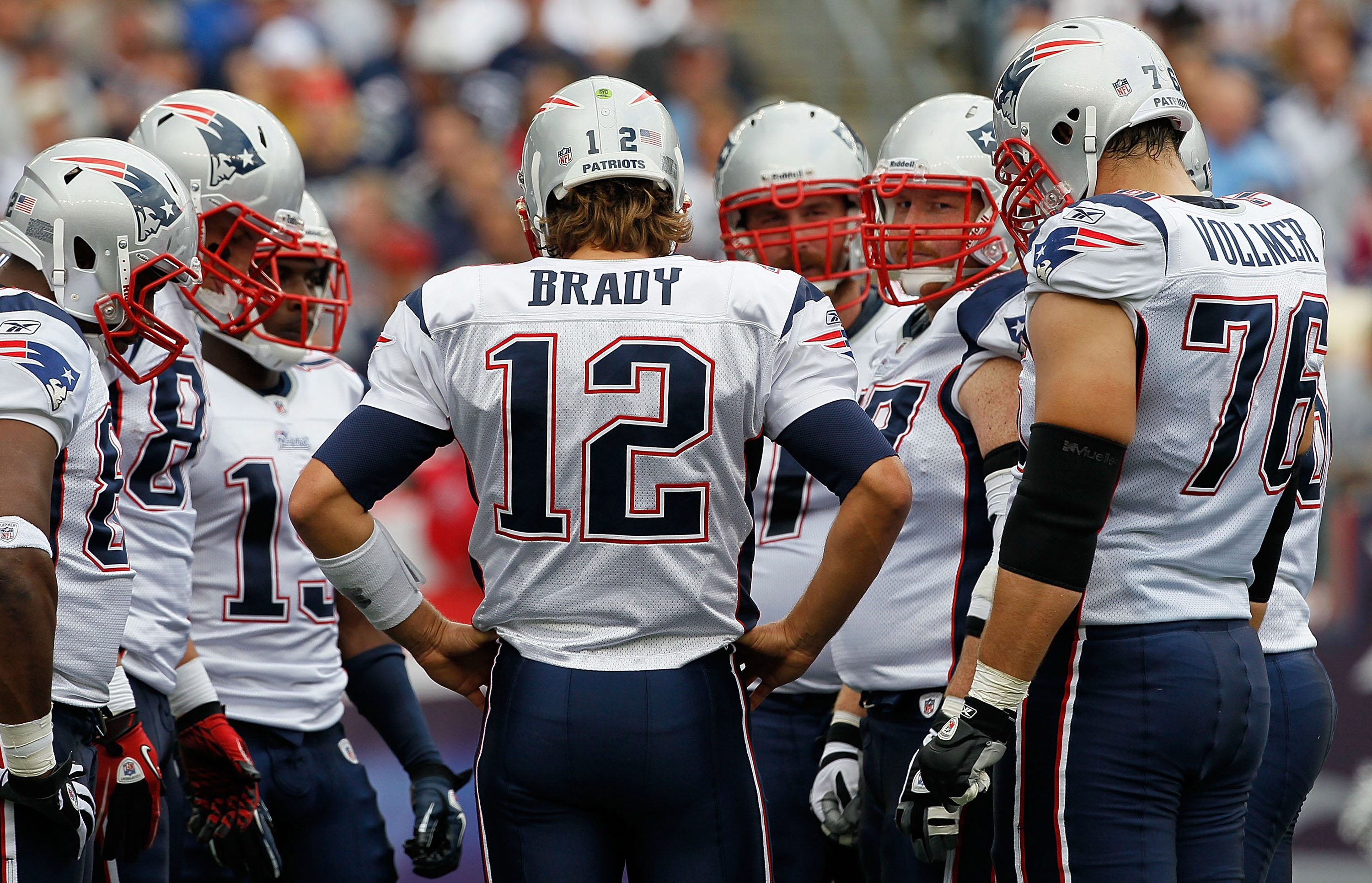 New England Patriots quarterback Tom Brady (12) gives wide recceiver Randy  Moss (81) a high five after Brady scored in the third quarter against the  Washington Redskins at Gillette Stadium in Foxboro