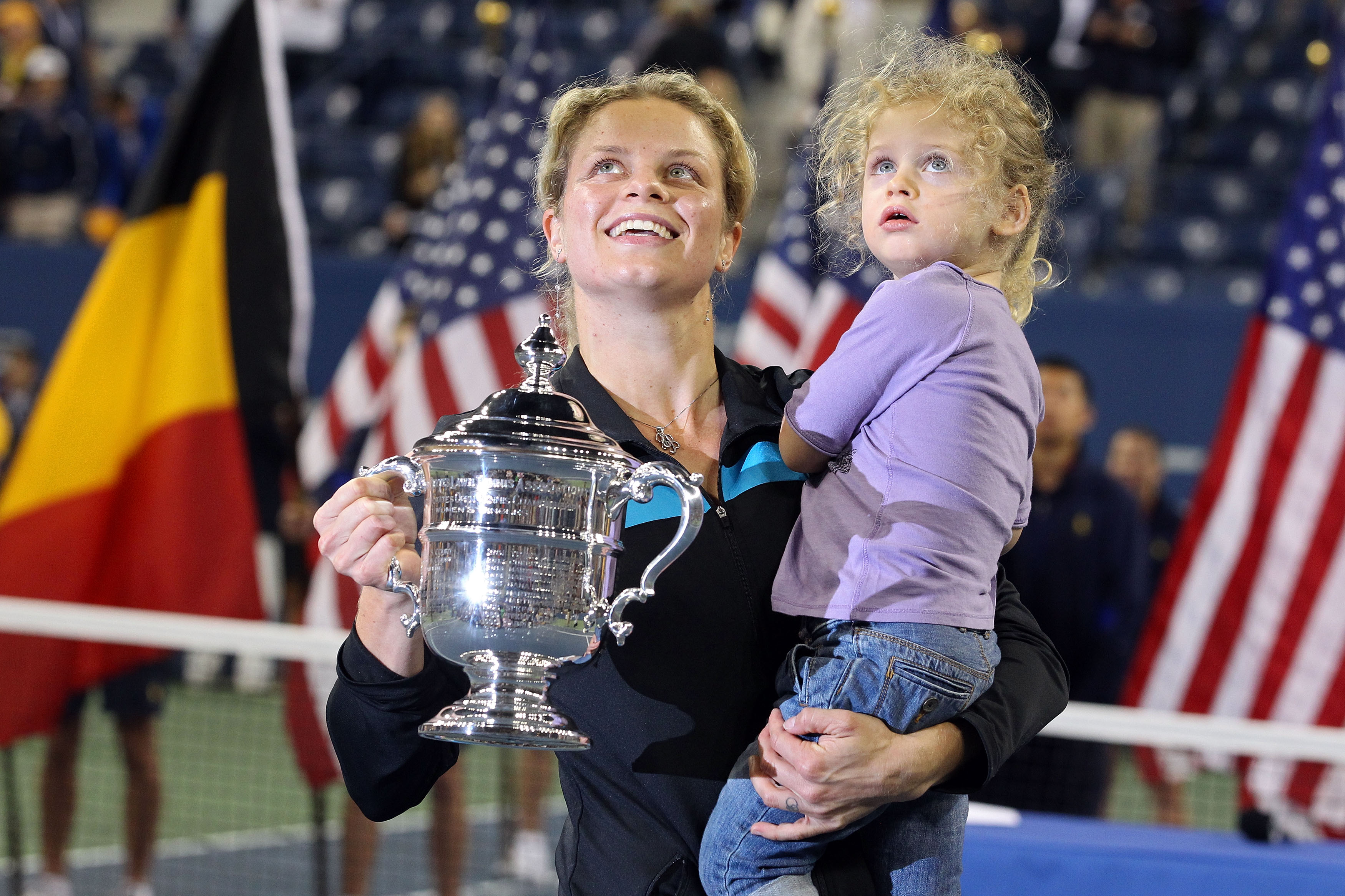 NEW YORK - SEPTEMBER 11:  Kim Clijsters of Belgium and daughter Jada pose with the championship trophy after Clijsters defeated Vera Zvonareva of Russia during their women's singles final on day thirteen of the 2010 U.S. Open at the USTA Billie Jean King