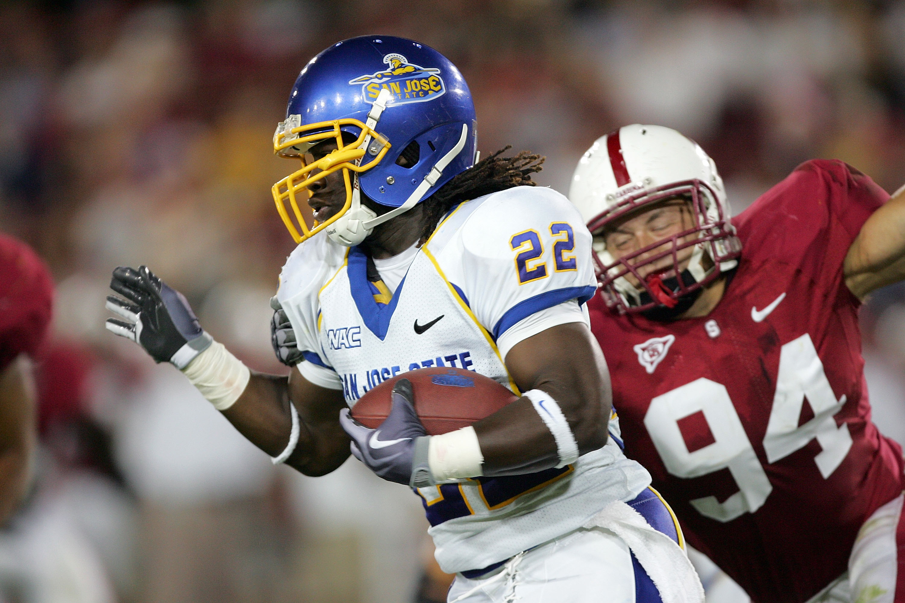 PALO ALTO, CA - SEPTEMBER 19: Lamon Muldrow #22 of the San Jose State Spartans runs past Thomas Keiser #94 of the Stanford Cardinal at Stanford Stadium on September 19, 2009 in Palo Alto, California. (Photo by Ezra Shaw/Getty Images)