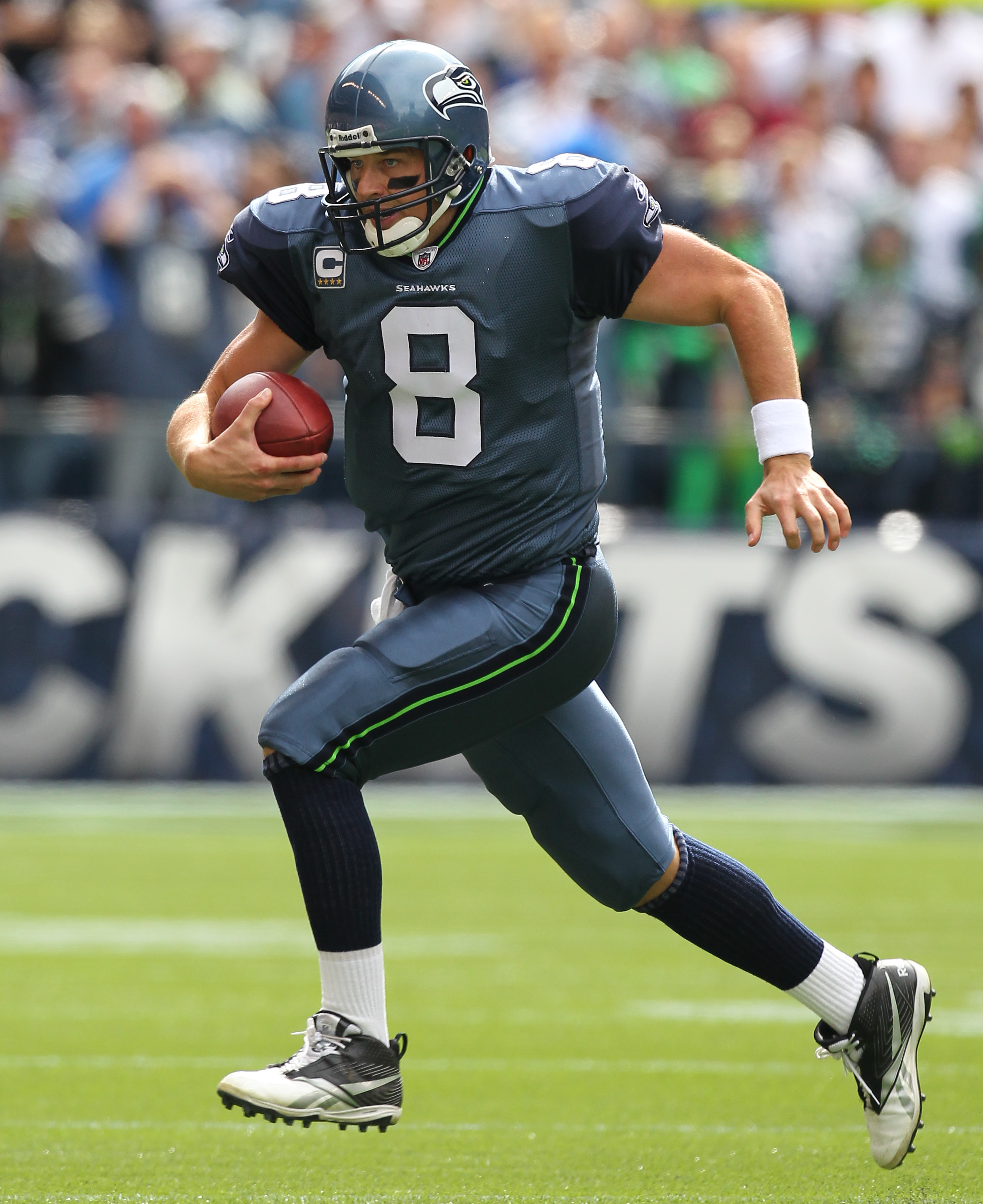 SEATTLE - SEPTEMBER 12:  Quarterback Matt Hasselbeck #8 of the Seattle Seahawks scrambles during the NFL season opener against the San Francisco 49ers at Qwest Field on September 12, 2010 in Seattle, Washington. (Photo by Otto Greule Jr/Getty Images)