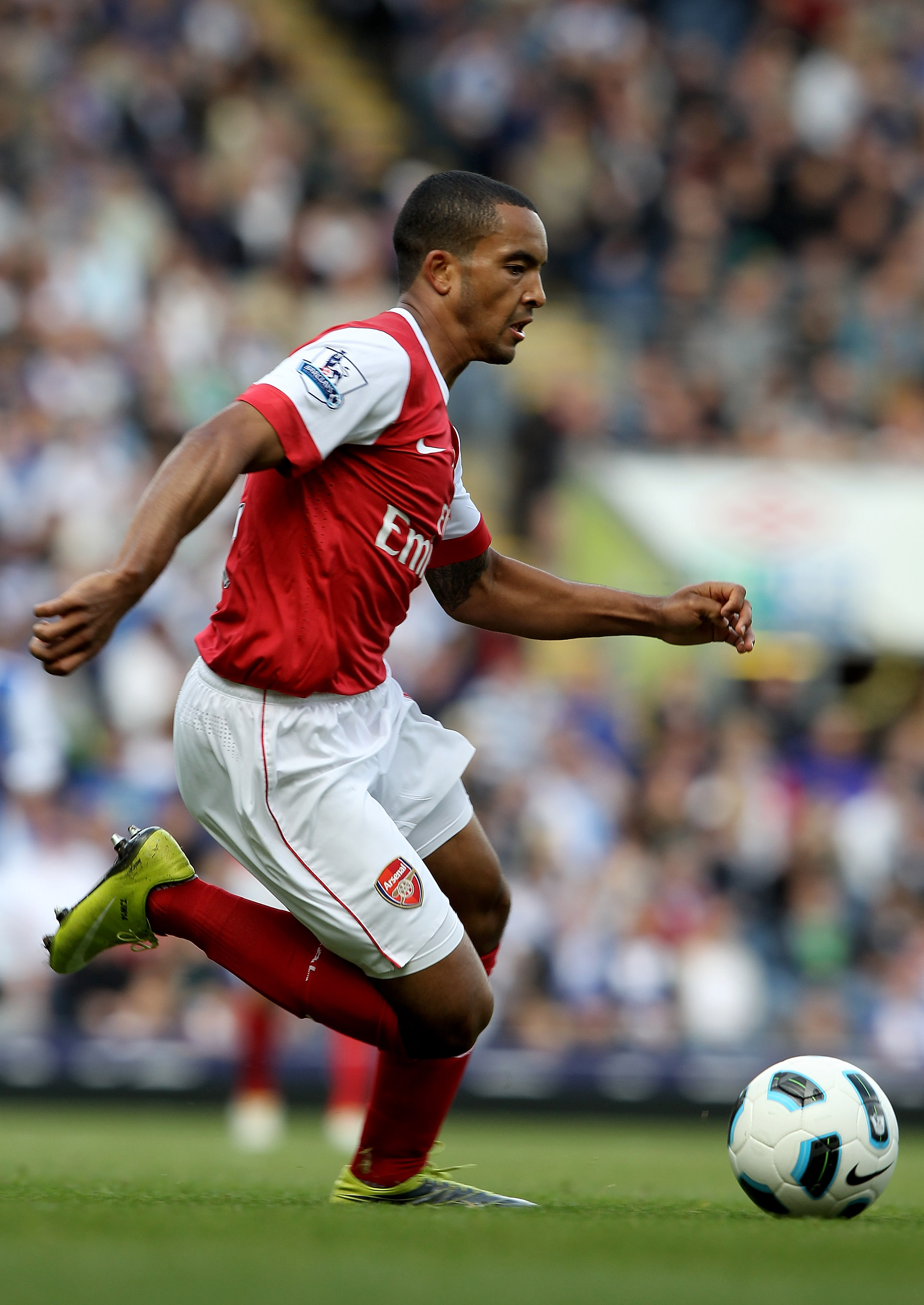 BLACKBURN, ENGLAND - AUGUST 28:  Theo Walcott of Arsenal in action during the Barclays Premier League match between Blackburn Rovers and Arsenal at Ewood Park on August 28, 2010 in Blackburn, England.  (Photo by Clive Brunskill/Getty Images)