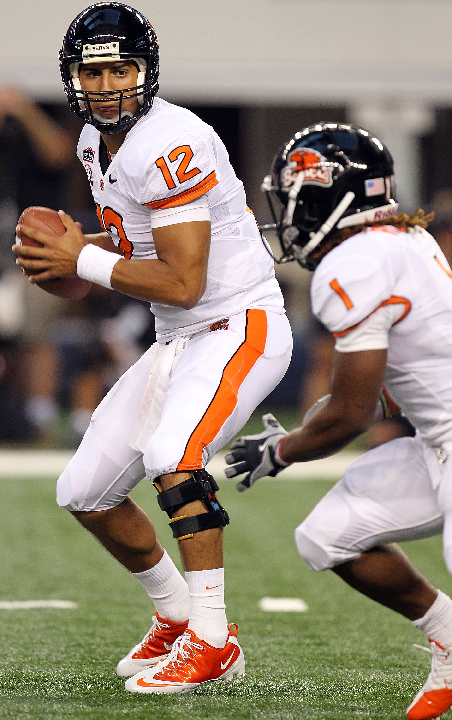 ARLINGTON, TX - SEPTEMBER 04: Quarterback Ryan Katz #12 of the Oregon State Beavers drops back to pass against the TCU Horned Frogs at Cowboys Stadium on September 4, 2010 in Arlington, Texas. (Photo by Ronald Martinez/Getty Images)