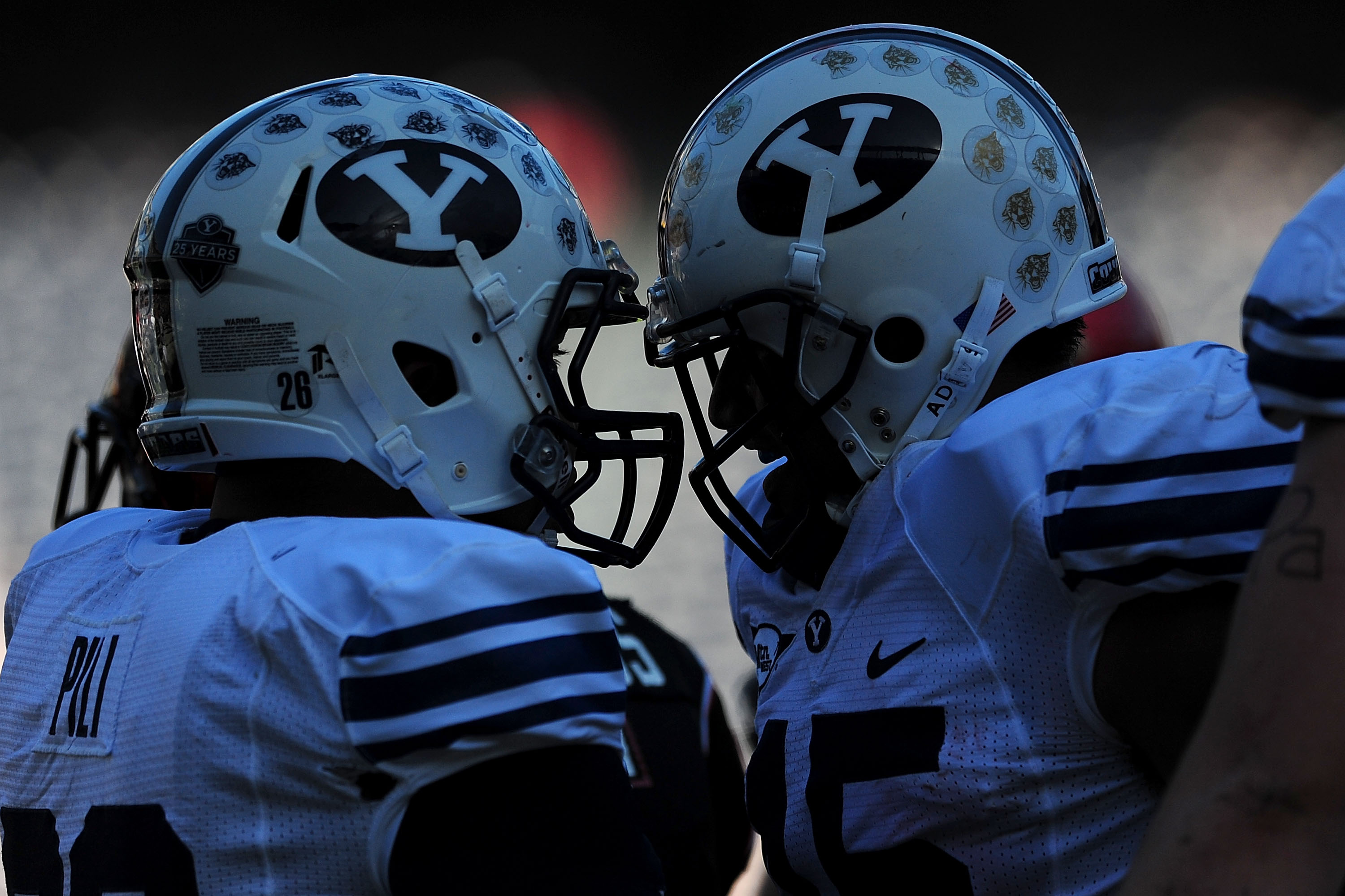 SAN DIEGO - OCTOBER 17: Max Hall #15 and Jo Jo Pili #26 of BYU Cougars celebrate a touchdown against San Diego State Aztecs at Qualcomm Stadium on October 17, 2009 in San Diego, California. (Photo by Jacob de Golish/Getty Images)