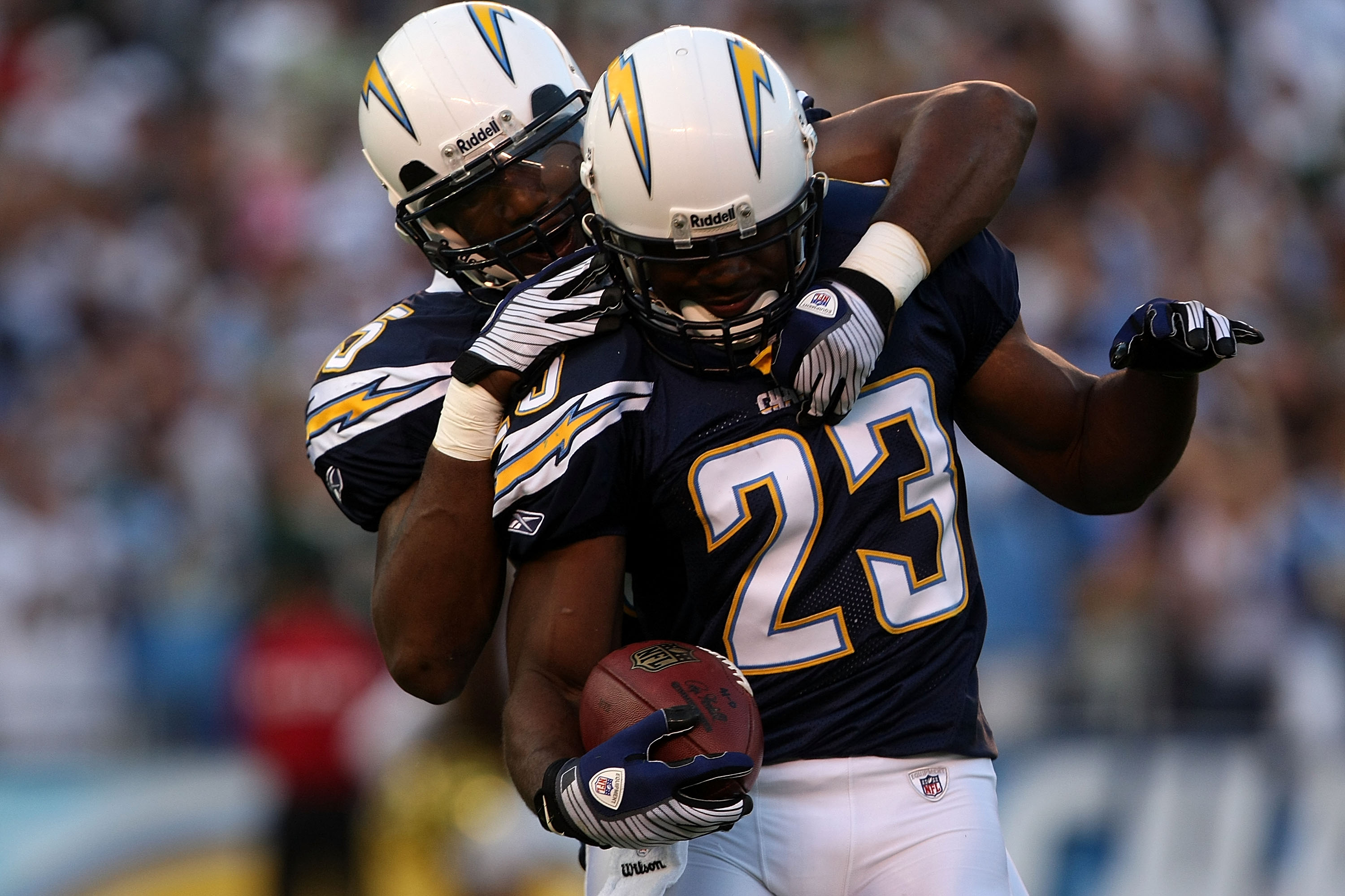 SAN DIEGO - SEPTEMBER 22:  Quentin Jammer #23 of the San Diego Chargers celebrates with teammate Shaun Phillips #95 after Jammer recovers a fumble for 23-yards in the first half against the New York Jets on September 22, 2008 at Qualcomm Stadium in San Di