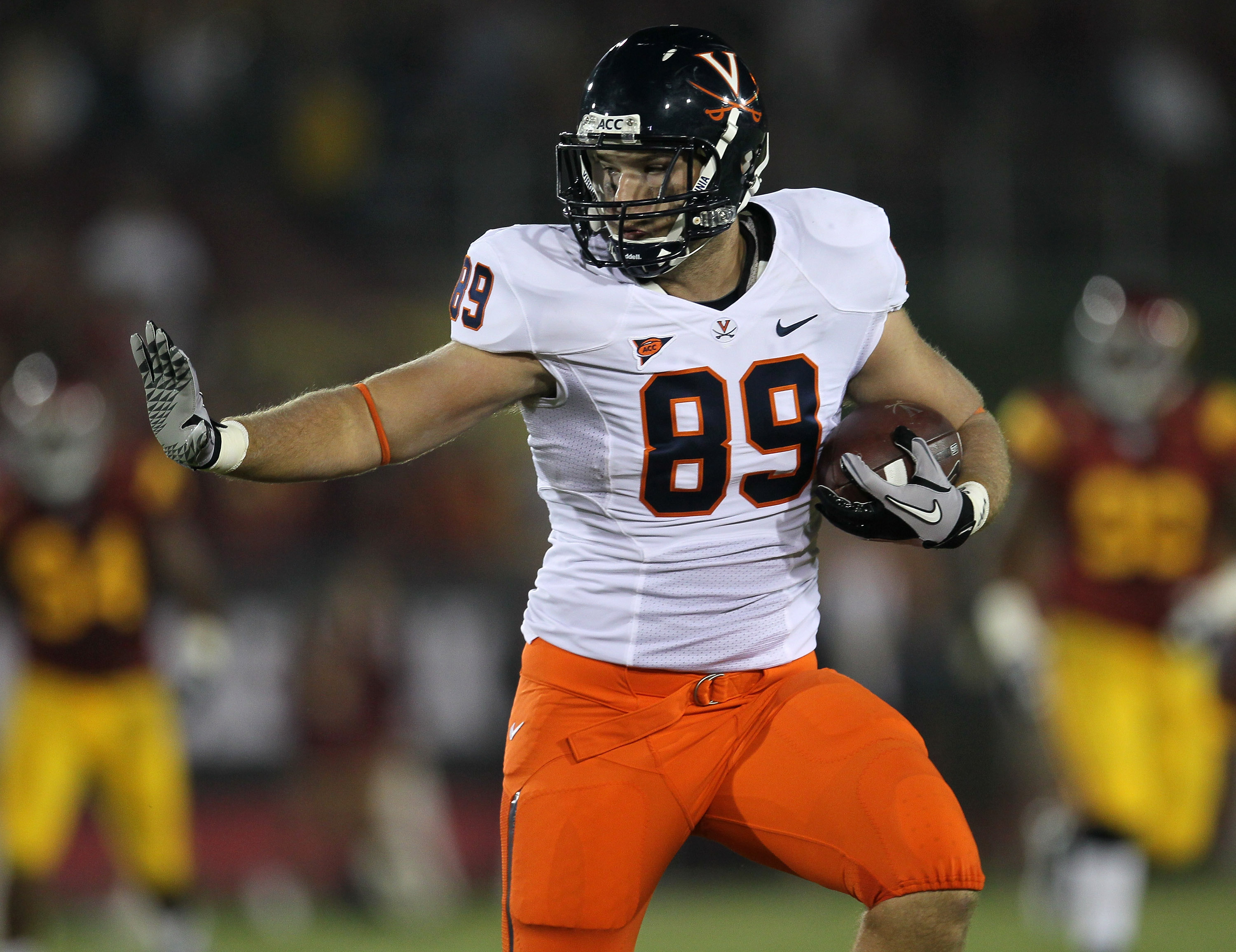 LOS ANGELES - SEPTEMBER 11: Tight end Joe Torchia #83 of the Virginia Cavaliers carries the ball against the USC Trojans at Los Angeles Memorial Coliseum on September 11, 2010 in Los Angeles, California. (Photo by Stephen Dunn/Getty Images)