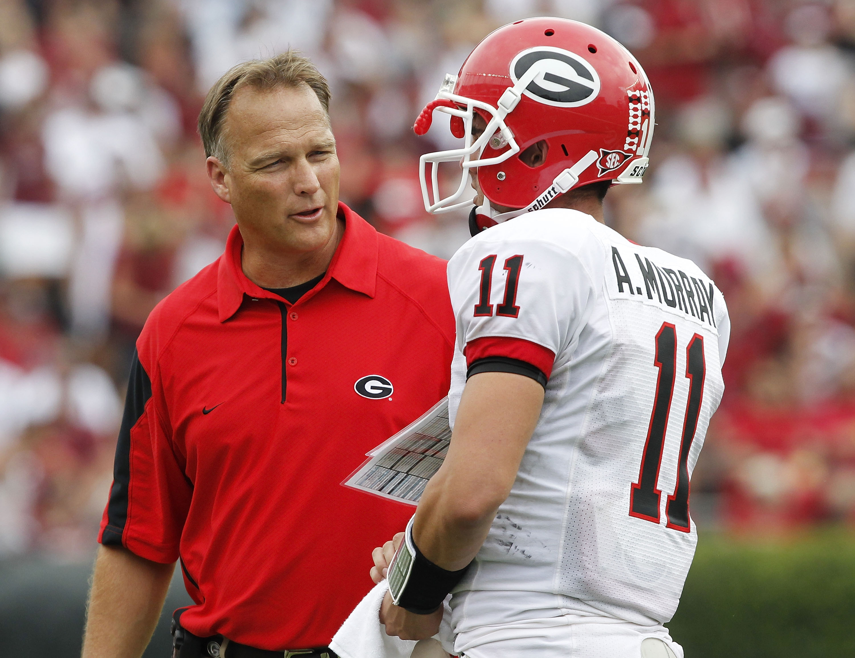 COLUMBIA, SC - SEPTEMBER 11: Head coach Mark Richt of the Georgia Bulldogs speaks with quarterback Aaron Murray #11 during the game against the South Carolina Gamecocks at Williams-Brice Stadium on September 11, 2010 in Columbia, South Carolina. The Gamec