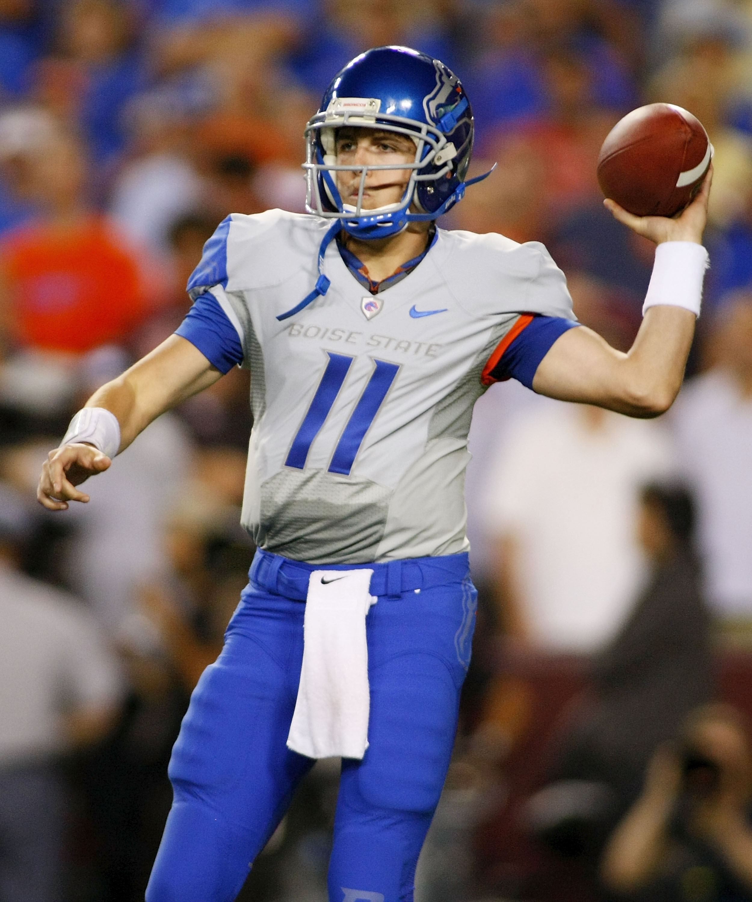 LANDOVER, MD - SEPTEMBER 06: Quarterback Kellen Moore #11 of the Boise State Broncos passes against the Virginia Tech Hokies at FedExField on September 6, 2010 in Landover, Maryland. (Photo by Geoff Burke/Getty Images)
