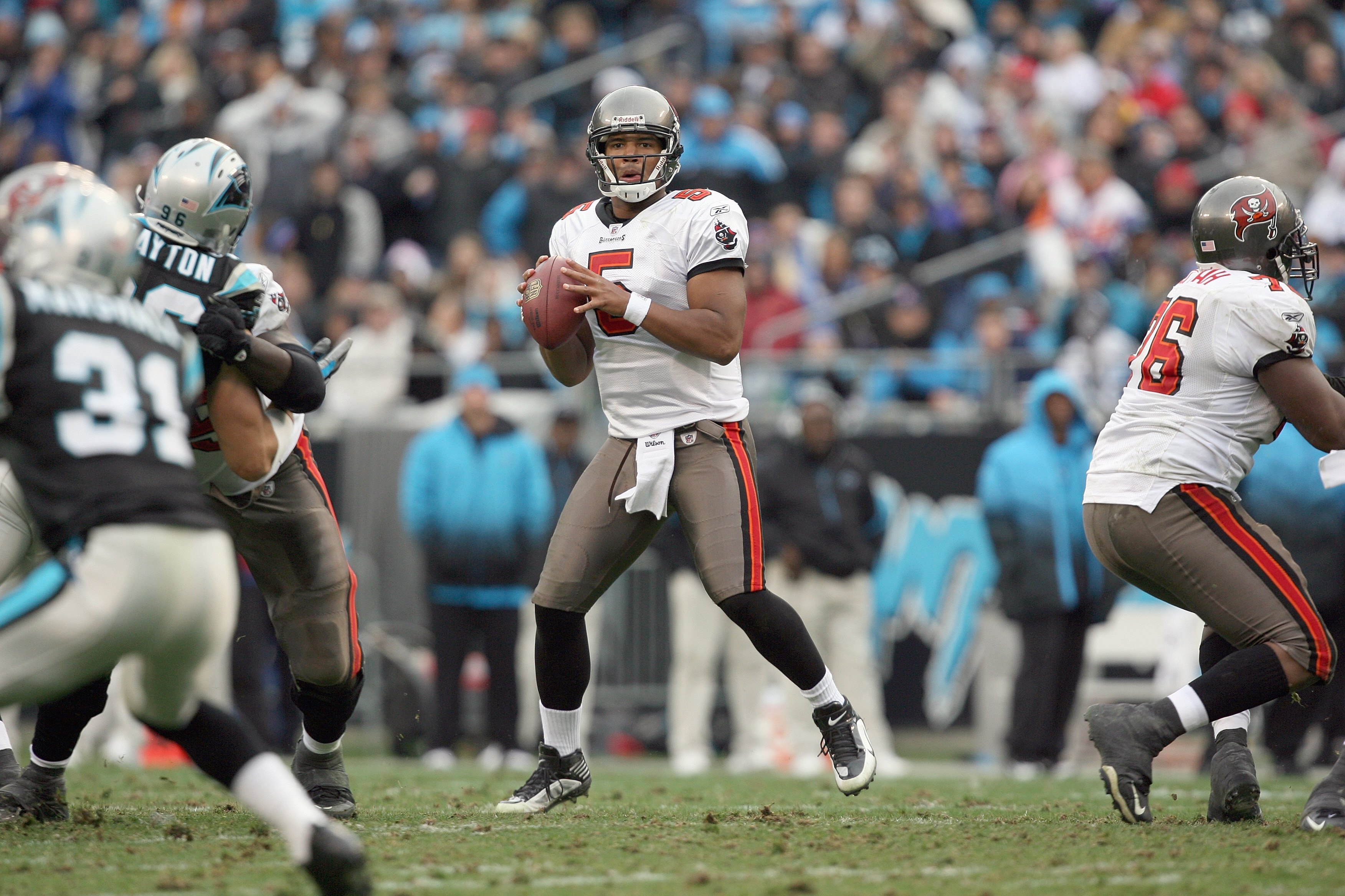 CHARLOTTE, NC - DECEMBER 06:  Josh Freeman #5 of the Tampa Bay Buccaneers looks to pass during the game against the Carolina Panthers at Bank of America Stadium on December 6, 2009 in Charlotte, North Carolina.  (Photo by Streeter Lecka/Getty Images)