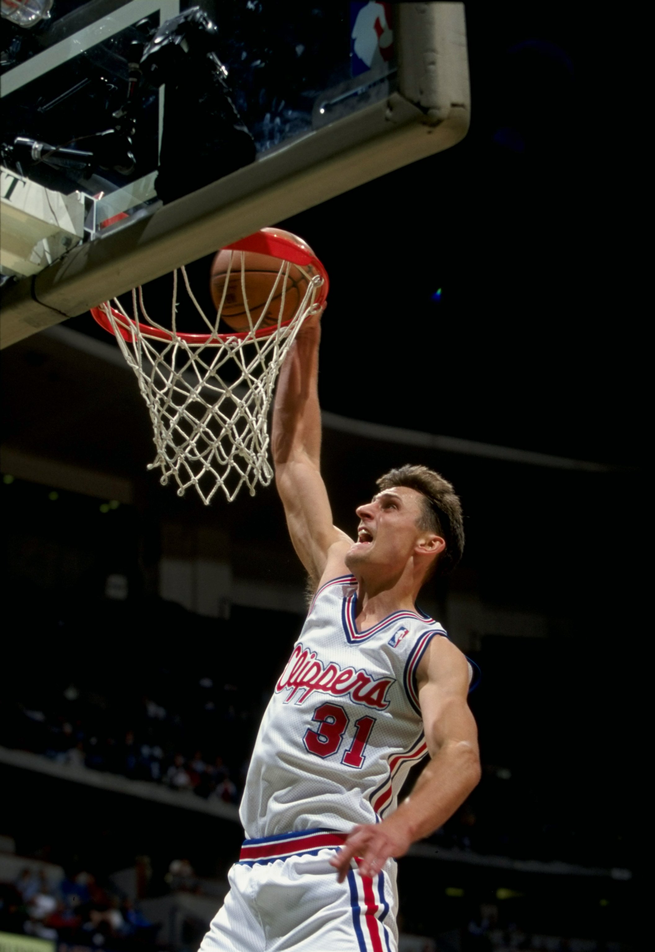 28 Nov 1997:  Guard Brent Barry of the Los Angeles Clippers in action against the New Jersey Nets during a game at Arrowhead Pond in Anaheim, California.  The Nets defeated the Clippers 104-92. Mandatory Credit: Todd Warshaw  /Allsport