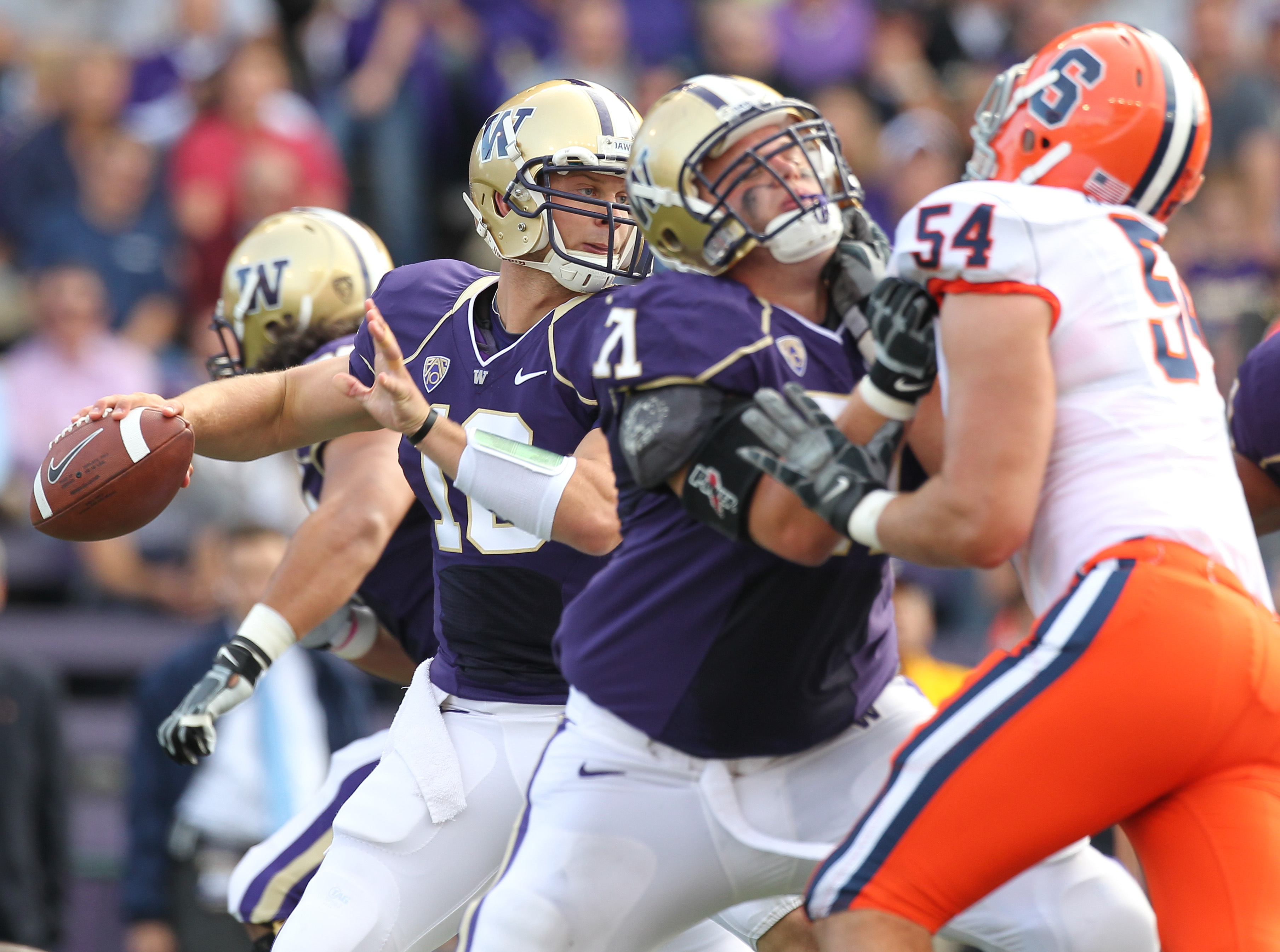 SEATTLE - SEPTEMBER 11: Quarterback Jake Locker #10 of the Washington Huskies passes against the Syracuse Orange on September 11, 2010 at Husky Stadium in Seattle, Washington. (Photo by Otto Greule Jr/Getty Images)