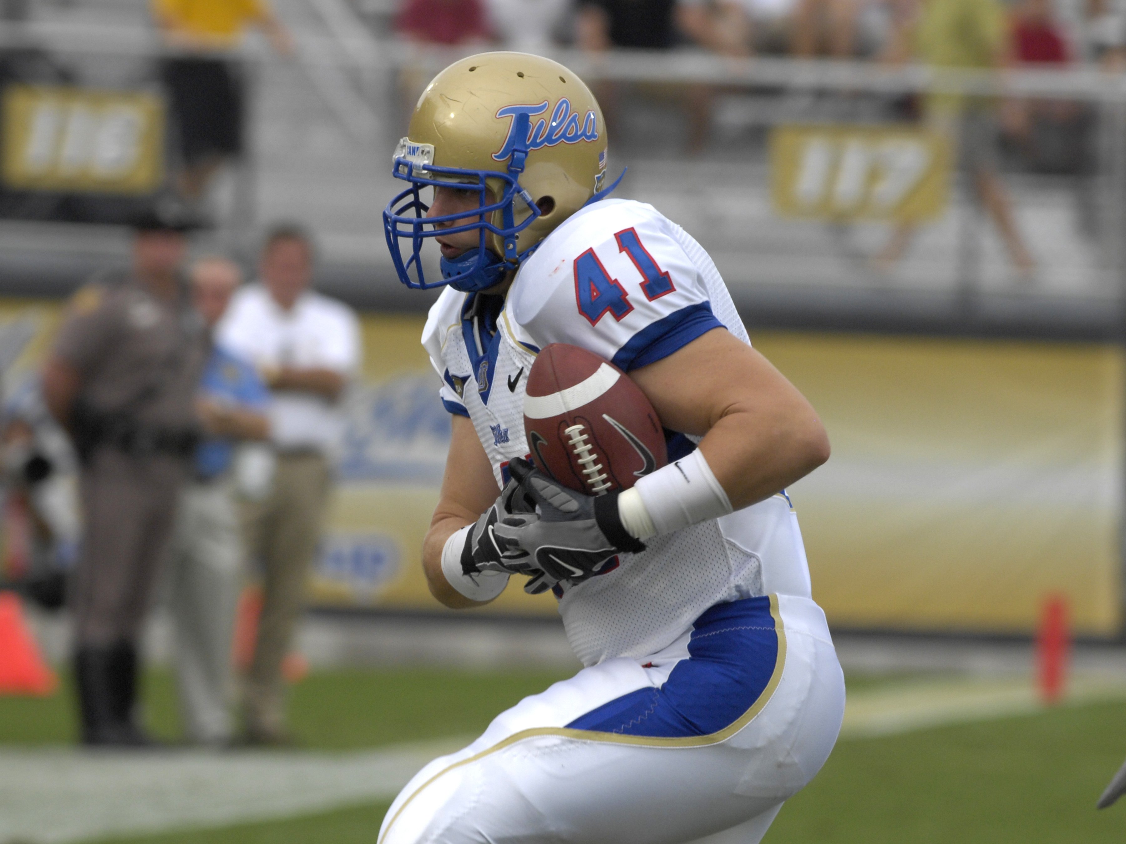 ORLANDO, FL - OCTOBER 20: Tight end Logan Cawyer #41 of the Tulsa Golden Hurricane clutches a pass against the University of Central Florida Knights at Bright House Stadium on October 20, 2007 in Orlando, Florida. UCF won 44 - 23. (Photo by Al Messerschm