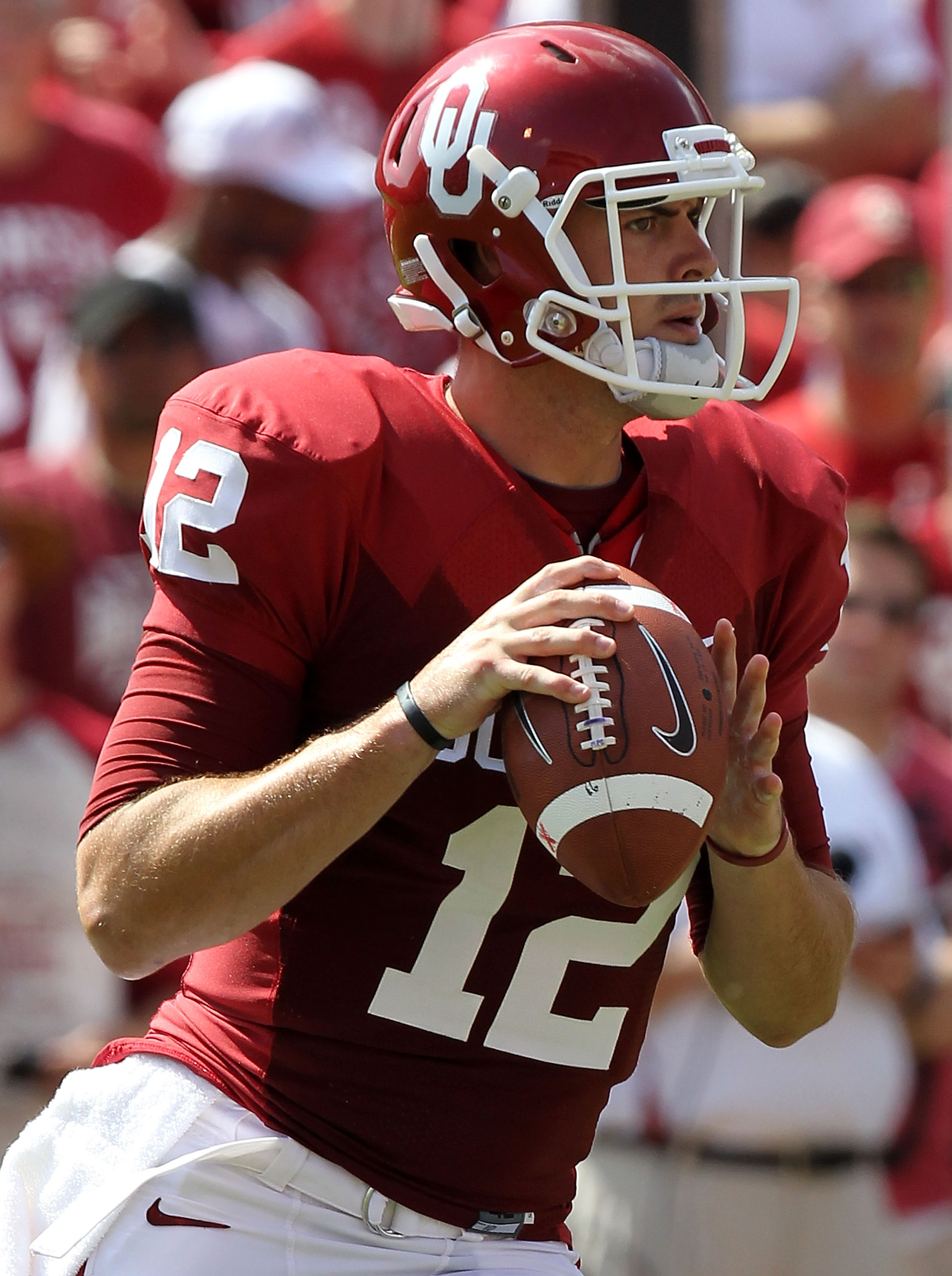 NORMAN, OK - SEPTEMBER 11: Quarterback Landry Jones #12 of the Oklahoma Sooners drops back to pass against the Florida State Seminoles in the first quarter at Gaylord Family Oklahoma Memorial Stadium on September 11, 2010 in Norman, Oklahoma. (Photo by