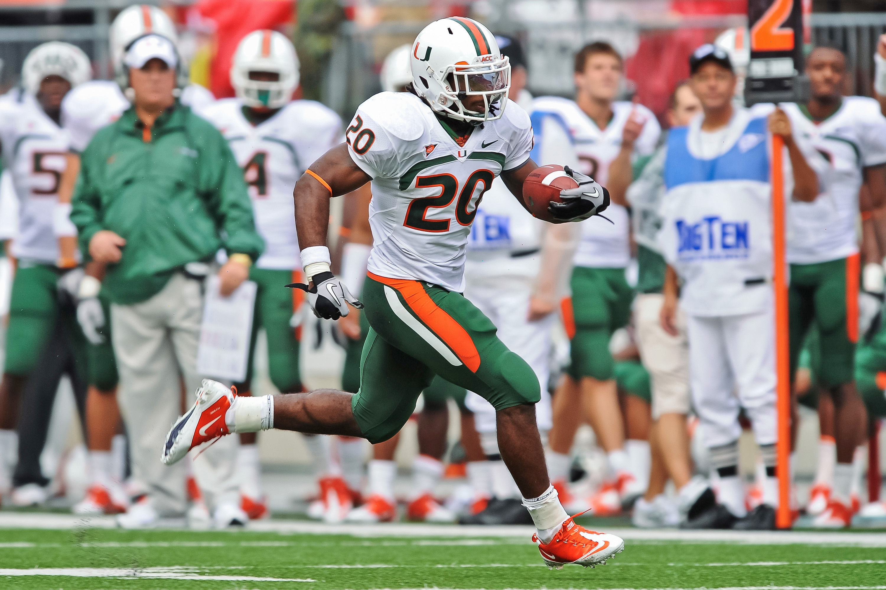 COLUMBUS, OH - SEPTEMBER 11: Damien Berry #20 of the Miami Hurricanes runs with the ball against the Ohio State Buckeyes at Ohio Stadium on September 11, 2010 in Columbus, Ohio. (Photo by Jamie Sabau/Getty Images)