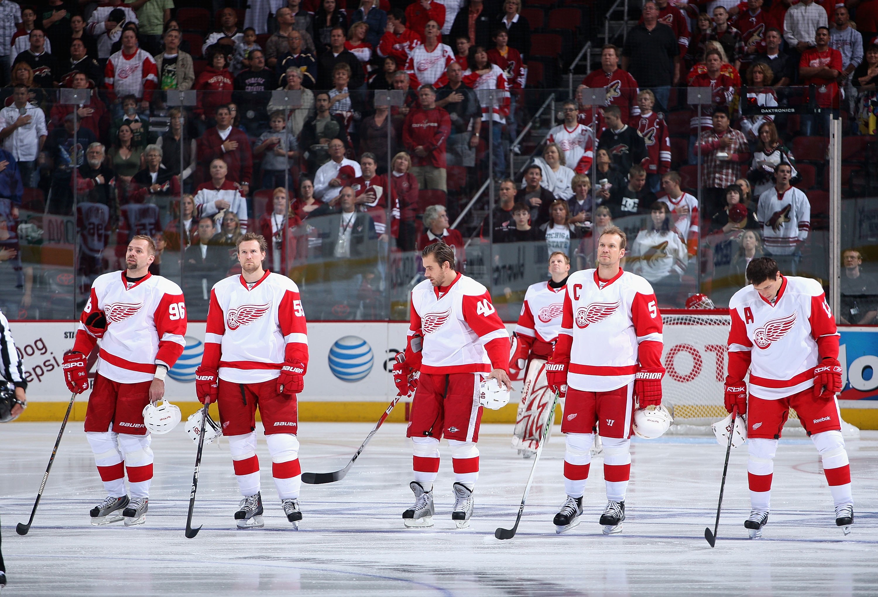 GLENDALE, AZ - OCTOBER 22:  (L-R) Tomas Holmstrom #96, Niklas Kronwall #55, Henrik Zetterberg #40, Chris Osgood #30, Nicklas Lidstrom #5 and Pavel Datsyuk #13 of the Detroit Red Wings stand attended for the National Anthem during the NHL game against the