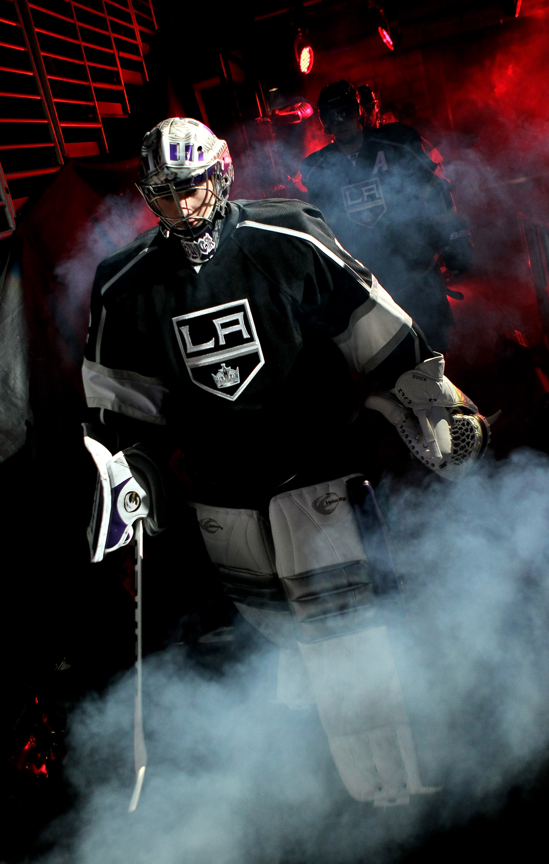 LOS ANGELES, CA - APRIL 25:  Goaltender Jonathan Quick #32 of the Los Angeles Kings leads his team onto the ice against the Vancouver Canucks before Game Six of the Western Conference Quarterfinals of the 2010 NHL Stanley Cup Playoffs on April 25, 2010 at