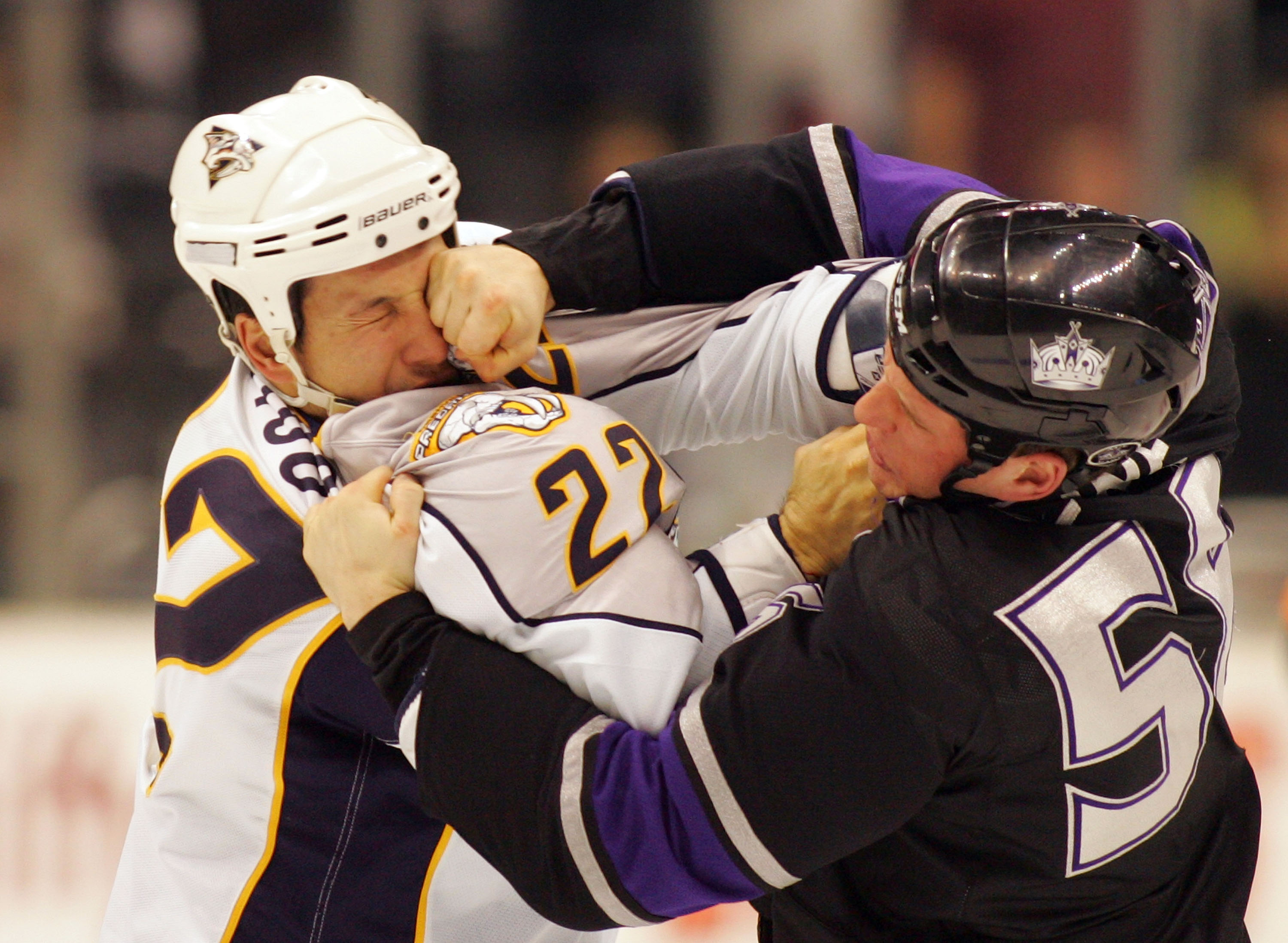 LOS ANGELES, CA - MARCH 14:  Richard Clune #56 of Los Angeles Kings punches Jordin Tootoo #22 of the Nashville Predators during their fight in the second period of their NHL game at the Staples Center on March 14, 2010 in Los Angeles, California.  (Photo 