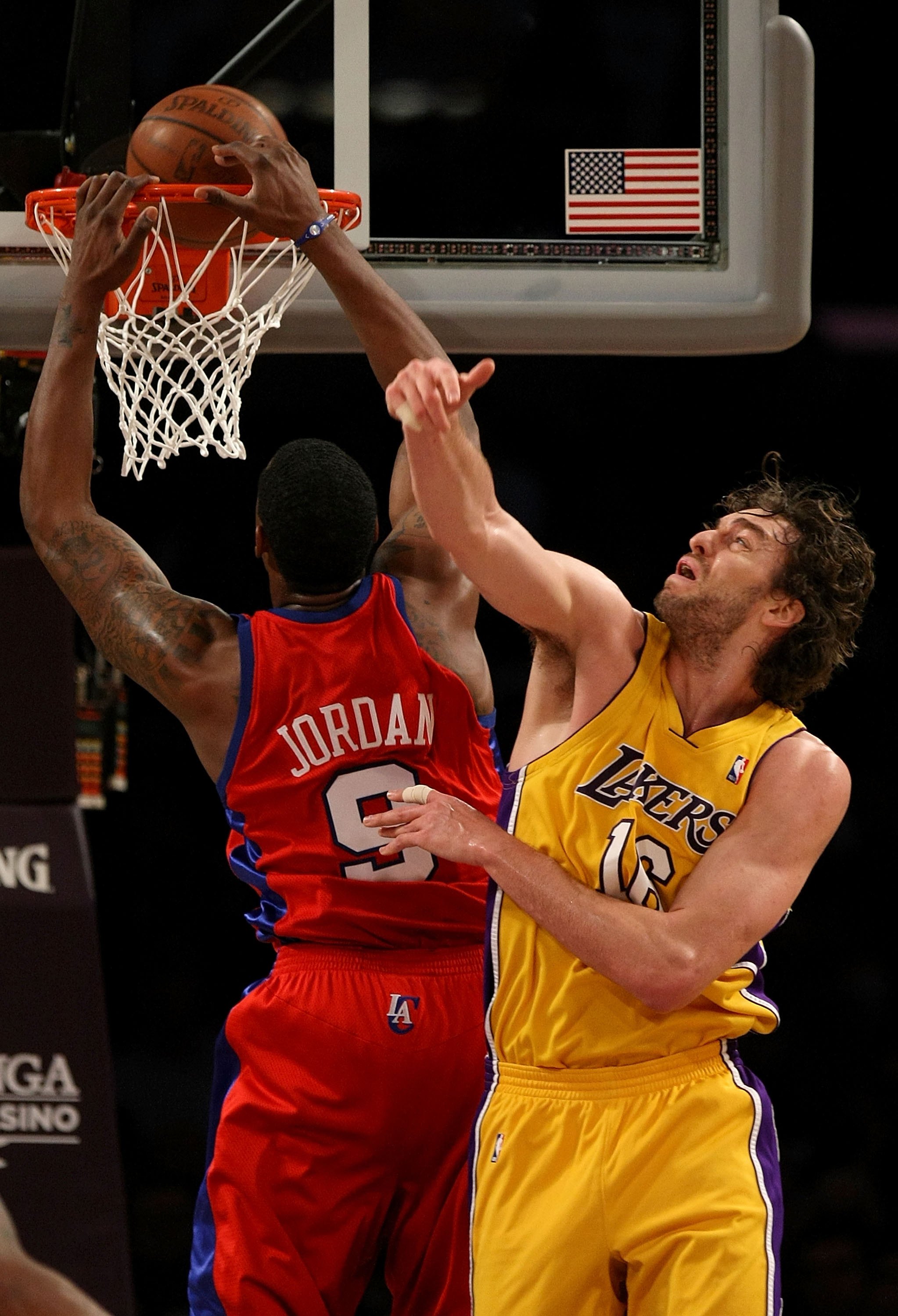 LOS ANGELES, CA - JANUARY 15:  DeAndre Jordan #9 of the Los Angeles Clippers dunks against Pau Gasol #16 of the Los Angeles Lakers during the game on January 15, 2010 at Staples Center in Los Angeles, California. The Lakers won 126-86. NOTE TO USER: User 