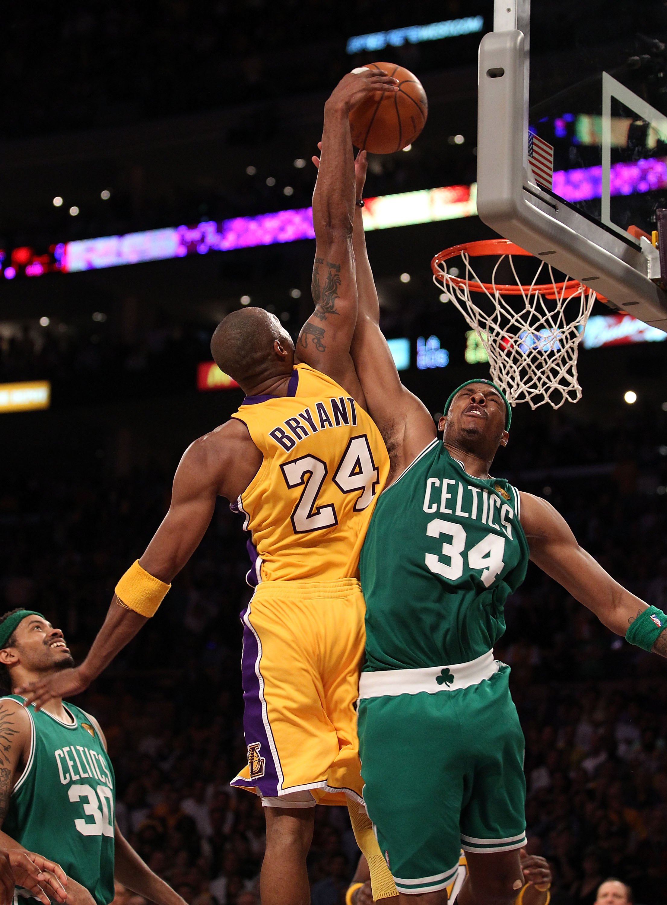 LOS ANGELES, CA - JUNE 17:  Kobe Bryant #24 of the Los Angeles Lakers goes up for a dunk over Paul Pierce #34 of the Boston Celtics in Game Seven of the 2010 NBA Finals at Staples Center on June 17, 2010 in Los Angeles, California.  NOTE TO USER: User exp
