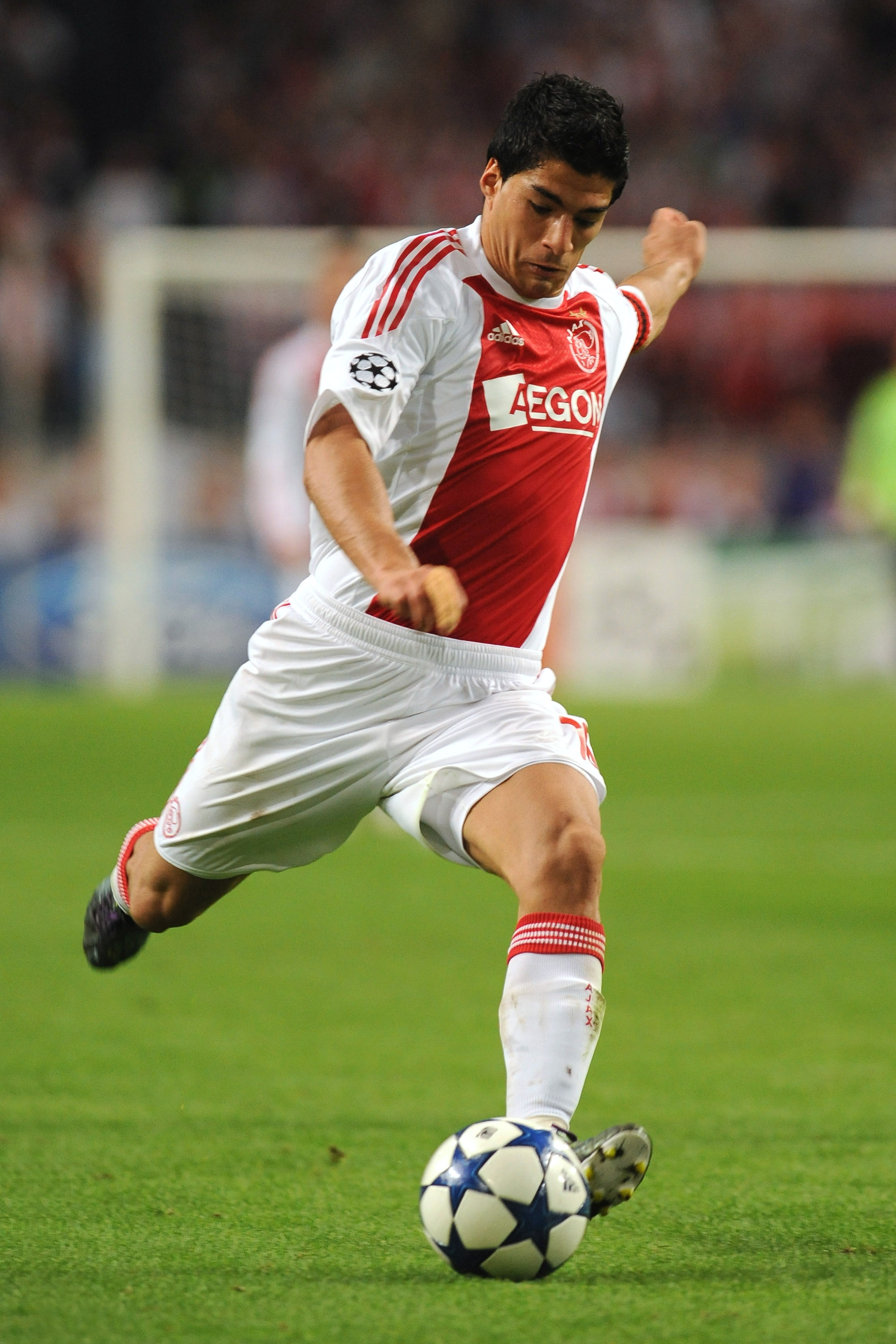 AMSTERDAM, NETHERLANDS - AUGUST 25:  Luis Suarez of AFC Ajax in action during the Champions League Play-off match between AFC Ajax and FC Dynamo Kiev at Amsterdam Arena on August 25, 2010 in Amsterdam, Netherlands.  (Photo by Valerio Pennicino/Getty Image