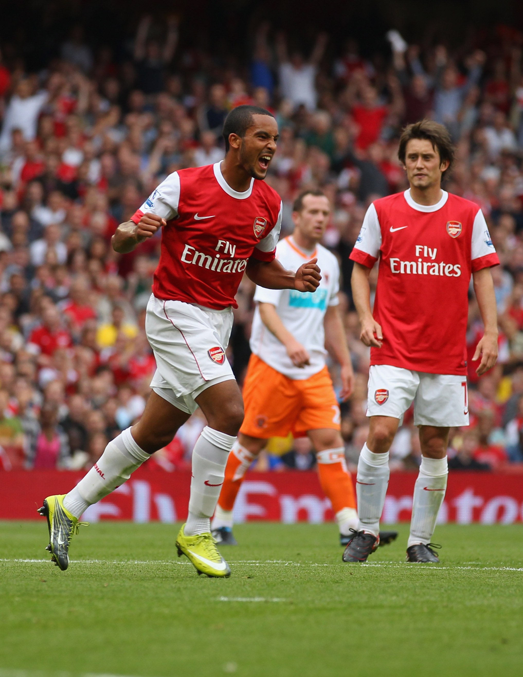 LONDON, ENGLAND - AUGUST 21:  Theo Walcott of Arsenal celebrates his third goal during the Barclays Premier League match between Arsenal and Blackpool at The Emirates Stadium on August 21, 2010 in London, England.  (Photo by Clive Rose/Getty Images)