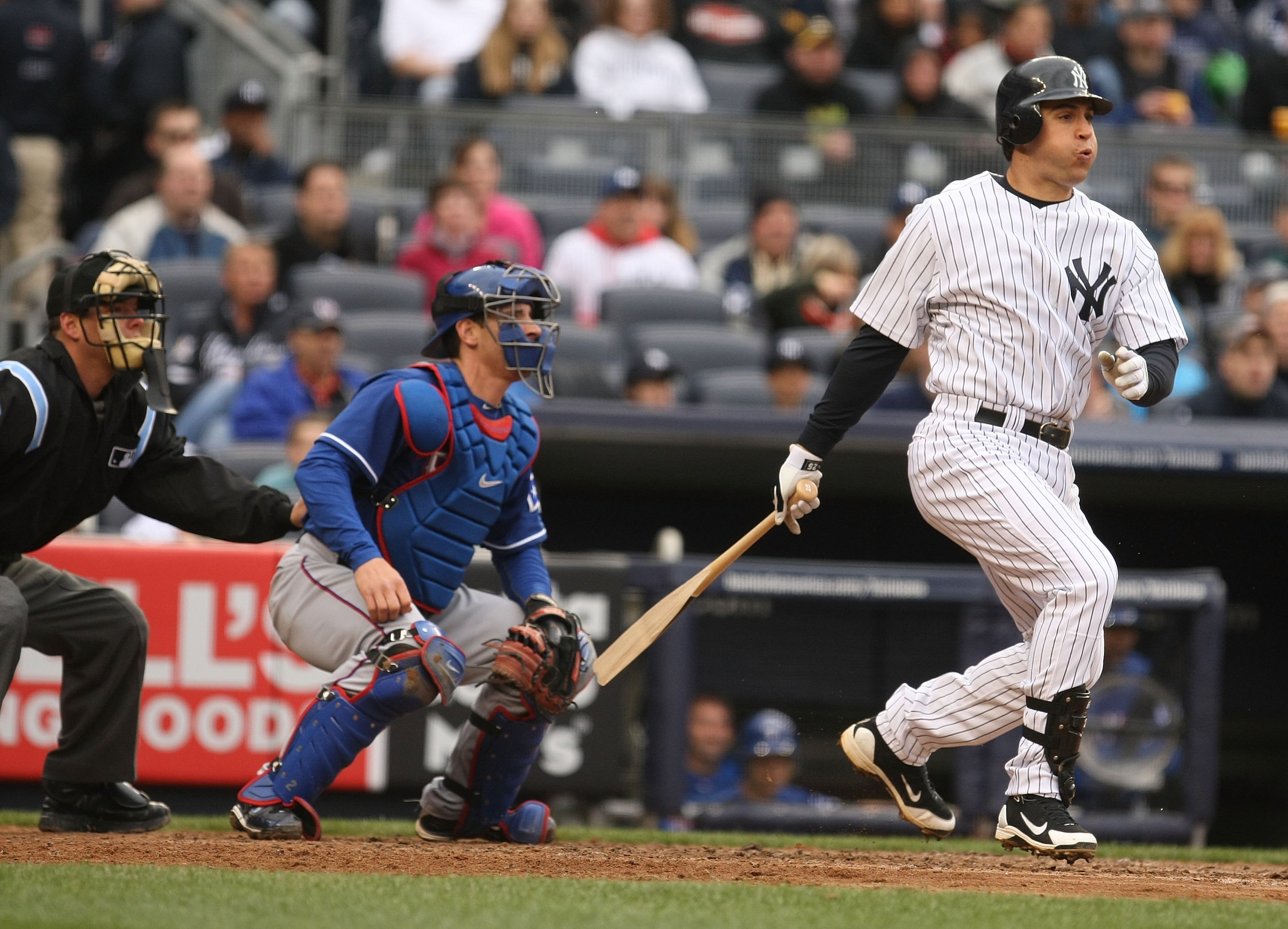 BRONX, NY - APRIL 17:  Mark Teixeira #25 of The New York Yankees drives in a run with a hit against the Texas Rangers during their game on April 17, 2010 at Yankee Stadium in the Bronx Borough of New York.  (Photo by Al Bello/Getty Images)
