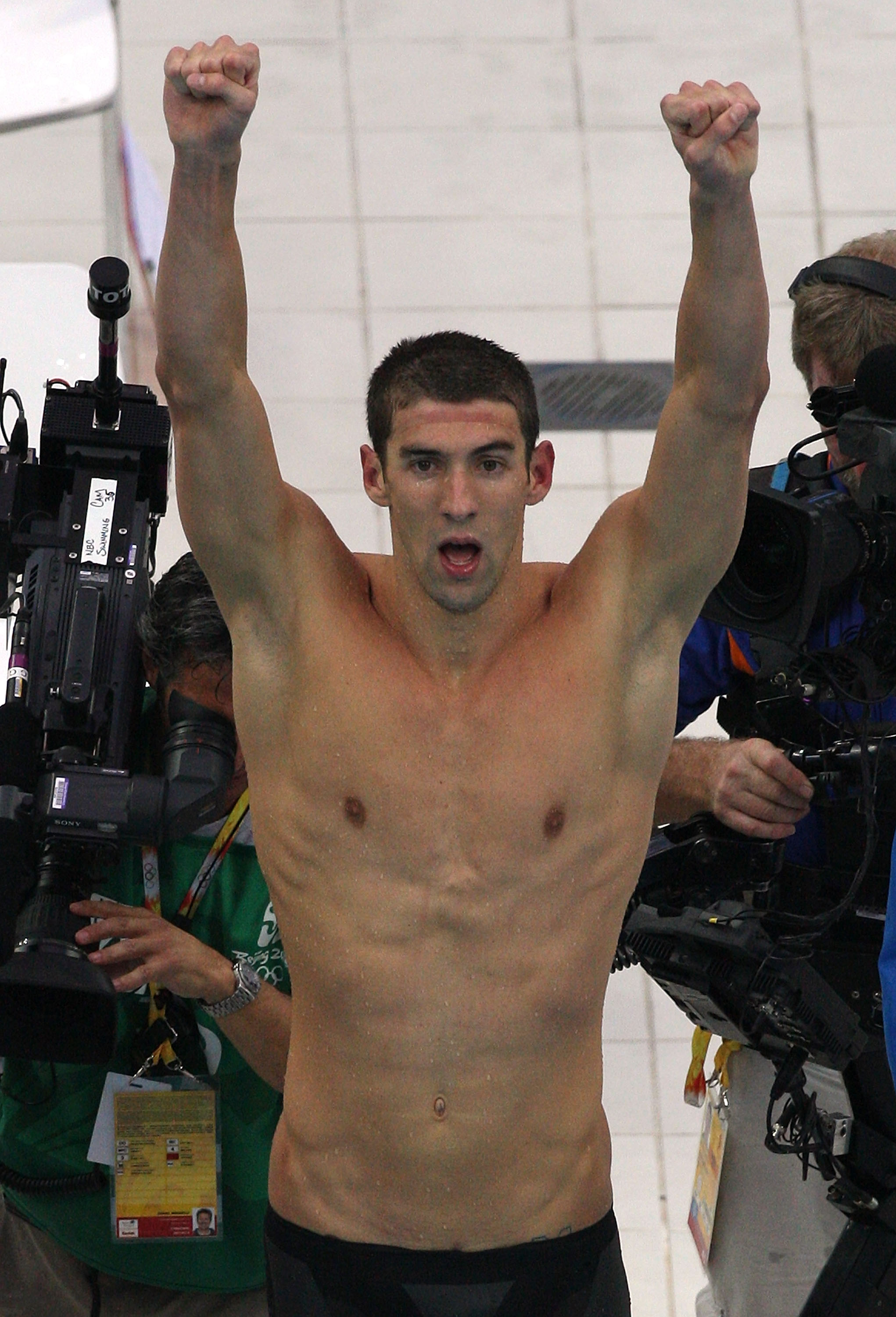 BEIJING - AUGUST 17:  Michael Phelps of the United States celebrates winning the Men's 4x100 Medley Relay with his team held at the National Aquatics Centre during Day 9 of the Beijing 2008 Olympic Games on August 17, 2008 in Beijing, China.  The United S