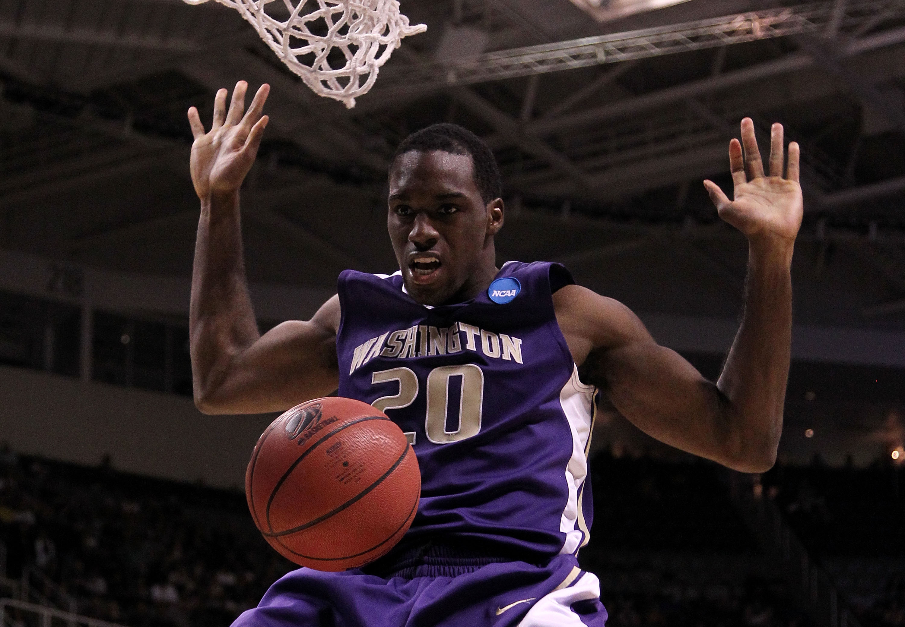 SAN JOSE, CA - MARCH 20: Forward Quincy Pondexter #20 of the Washington Huskies dunks the ball against the New Mexico Lobos during the second round of the 2010 NCAA men's basketball tournament at HP Pavilion on March 20, 2010 in San Jose, California. (P