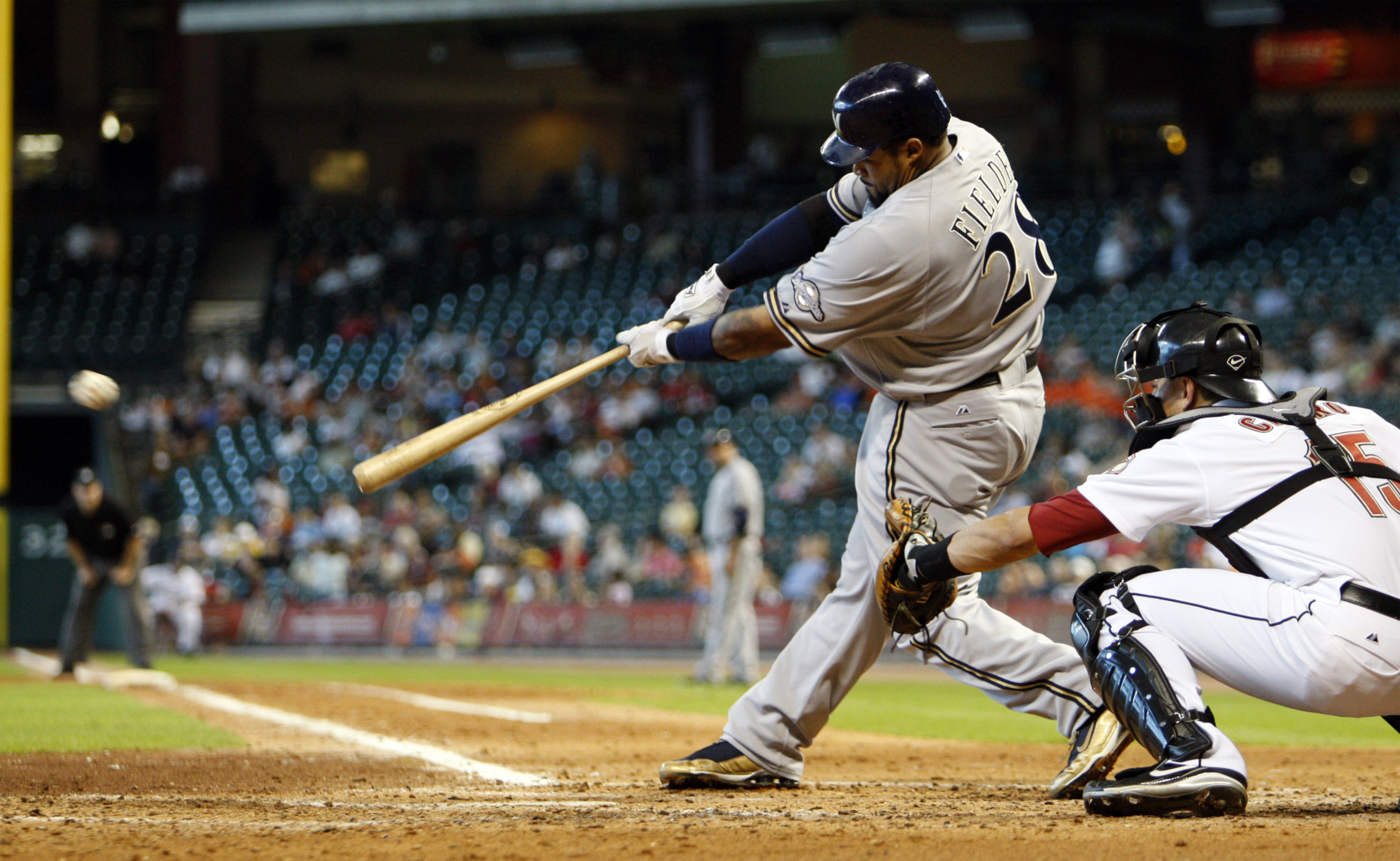 HOUSTON - SEPTEMBER 15:  Prince Fielder #28 of the Milwaukee Brewers hits a soft line drive to left field in the fifth inning against the Houston Astros on September 15, 2010 in Houston, Texas.  (Photo by Bob Levey/Getty Images)