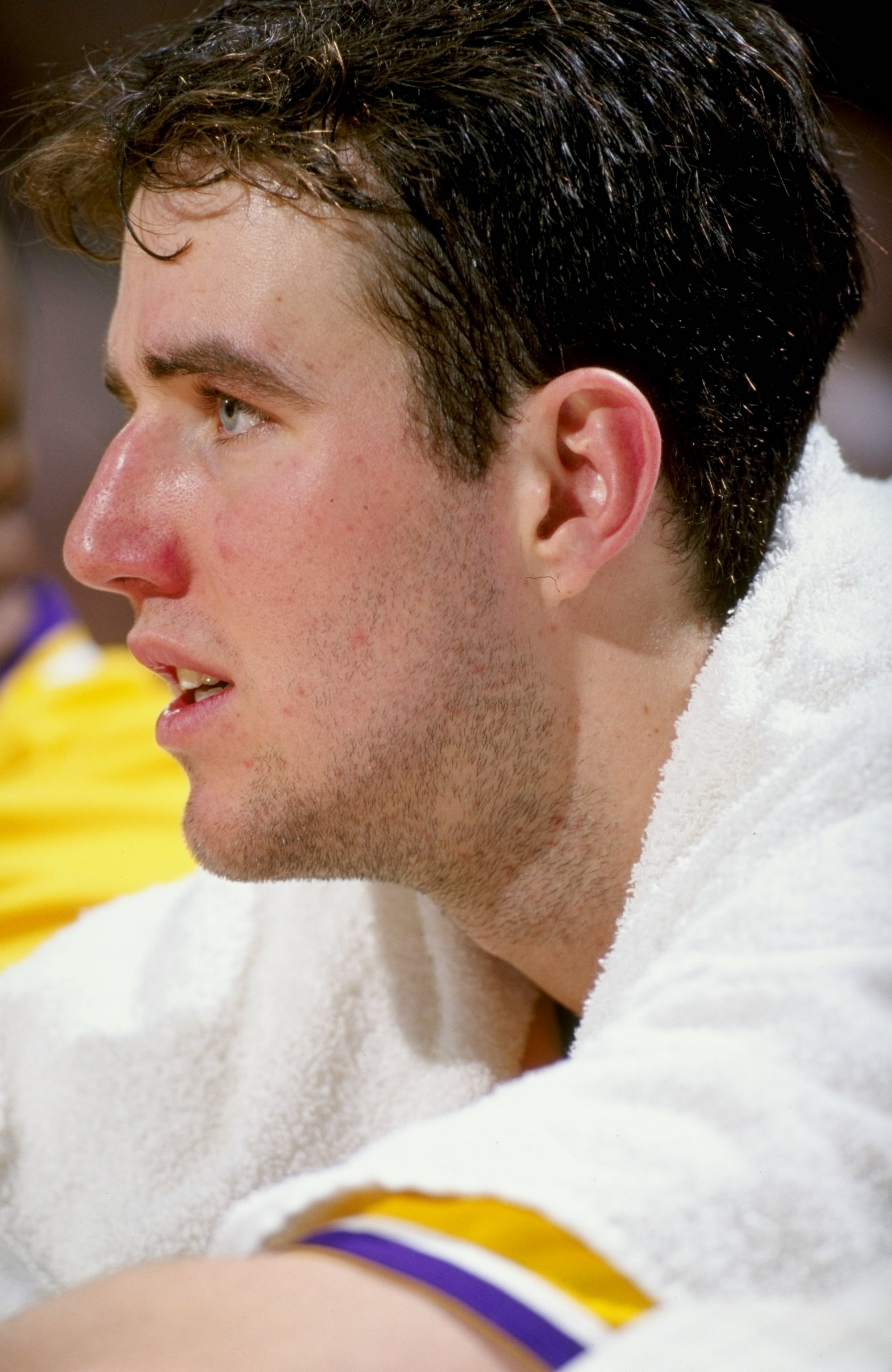 16 Feb 1999: Travis Knight #40 of the Los Angeles Lakers looks on as he sits on the bench during the game against the Charlotte Hornets at the Great Western Forum in Inglewood, California. The Lakers defeated the Hornets 116-88.  Mandatory Credit: Tom Hau