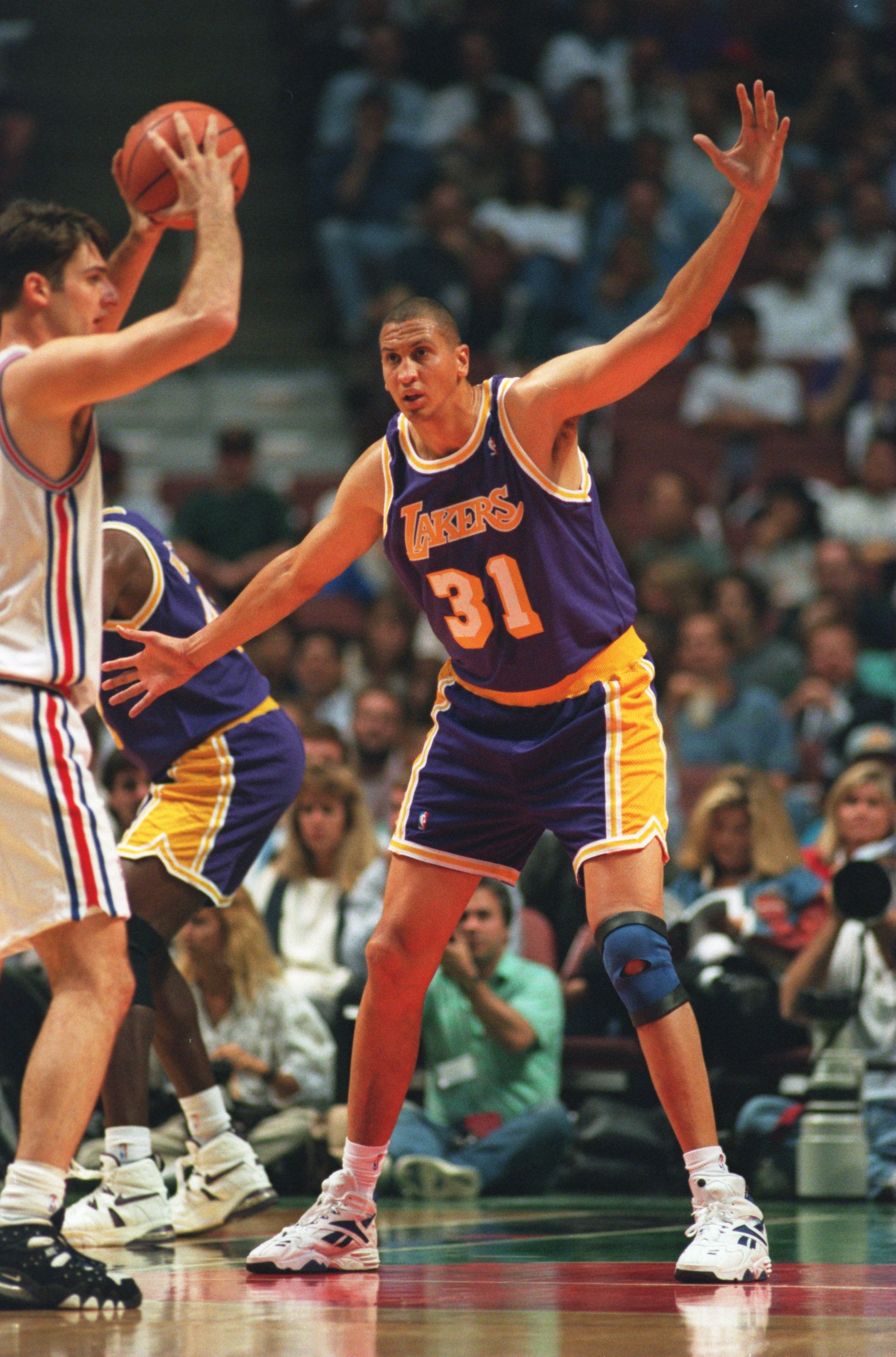 19 OCT 1994:  CENTER SAM BOWIE OF THE LOS ANGELES LAKERS DEFENDS AGAINST THE LOS ANGELES CLIPPERS DURING A 120-104 VICTORY AT THE POND IN ANAHEIM, CALIFORNIA. Mandatory Credit: Stephen Dunn/ALLSPORT