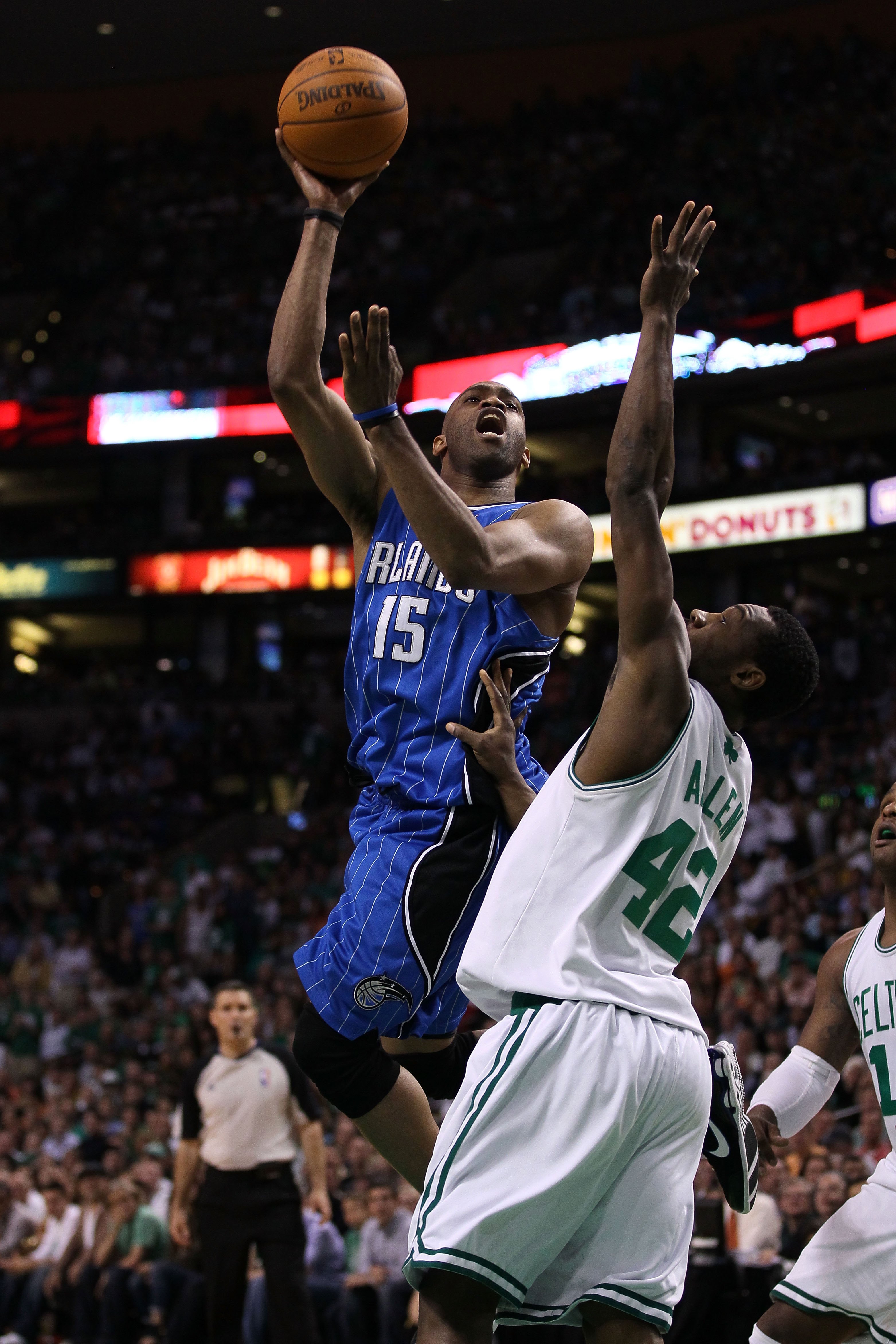 BOSTON - MAY 28:  Vince Carter #15 of the Orlando Magic attempts a shot against Tony Allen #42 of the Boston Celtics in Game Six of the Eastern Conference Finals during the 2010 NBA Playoffs at TD Garden on May 28, 2010 in Boston, Massachusetts.  NOTE TO
