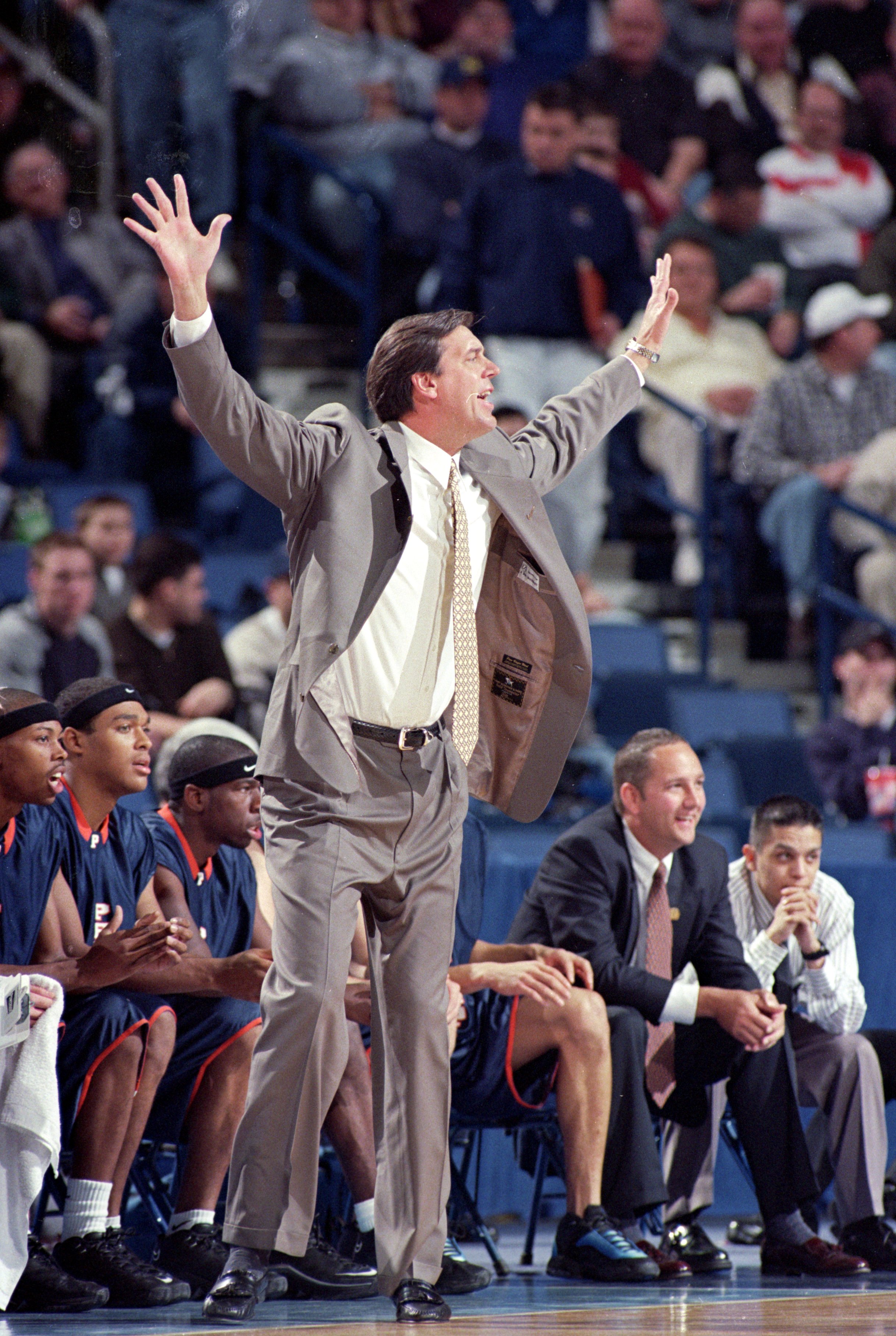 19 Mar 2000: Jan van Breda Kolff of the Pepperdine Waves reacts on  the sidelines during round one of the NCAA Tournament Game against the Oklahoma State Cowboys at the Marine Midland Arena in Buffalo, New York. The Cowboys defeated the Waves 75-67. Manda