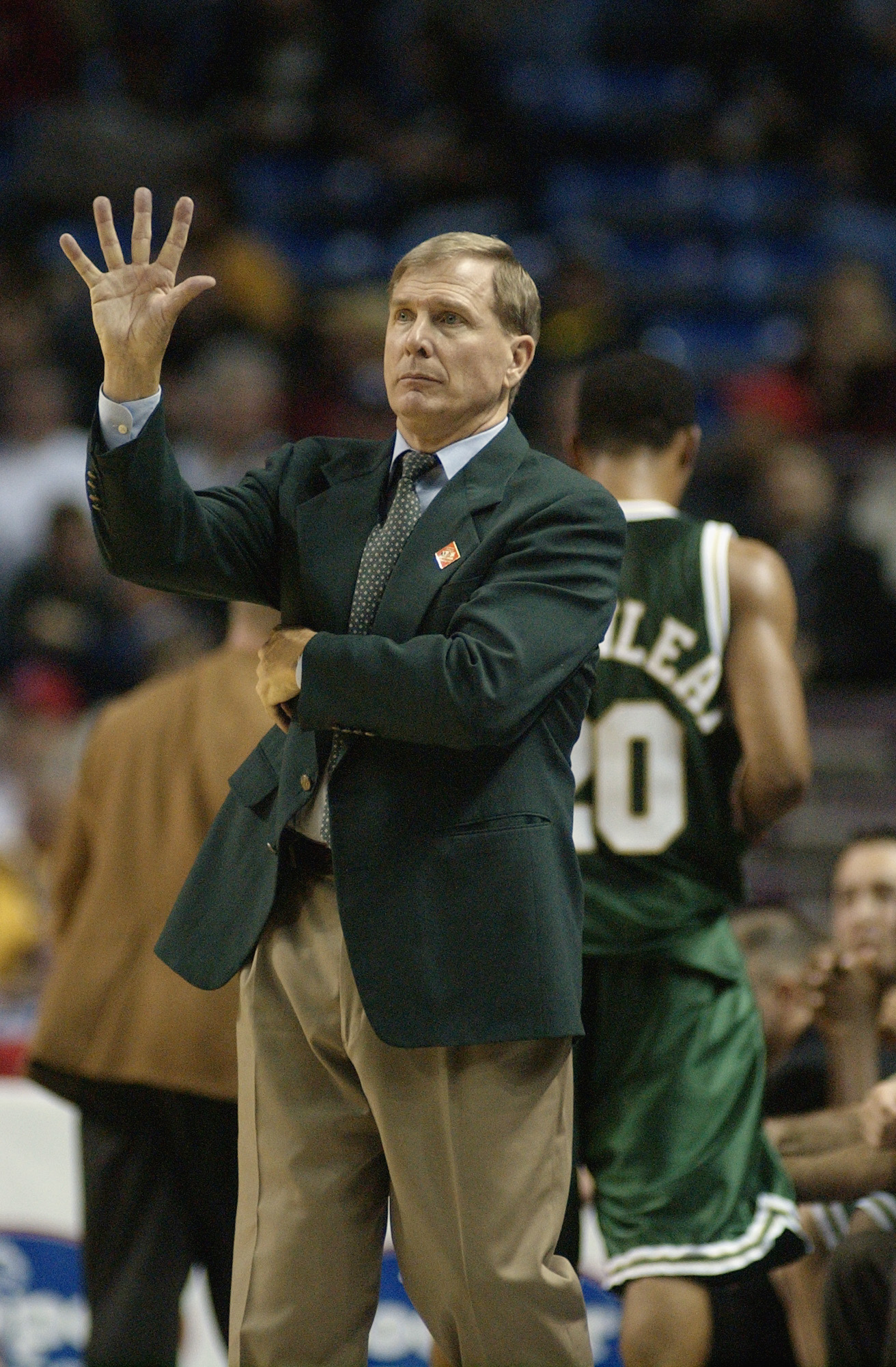 KANSAS CITY, MO - MARCH 7:  Head Coach Dave Bliss of the Baylor Bears signals to his team against the Kansas State Wildcats during the Big 12 first round game at Kemper Arena in Kansas City, Missouri on March 7, 2002.  Kansas State edged Baylor 74-73.  (P