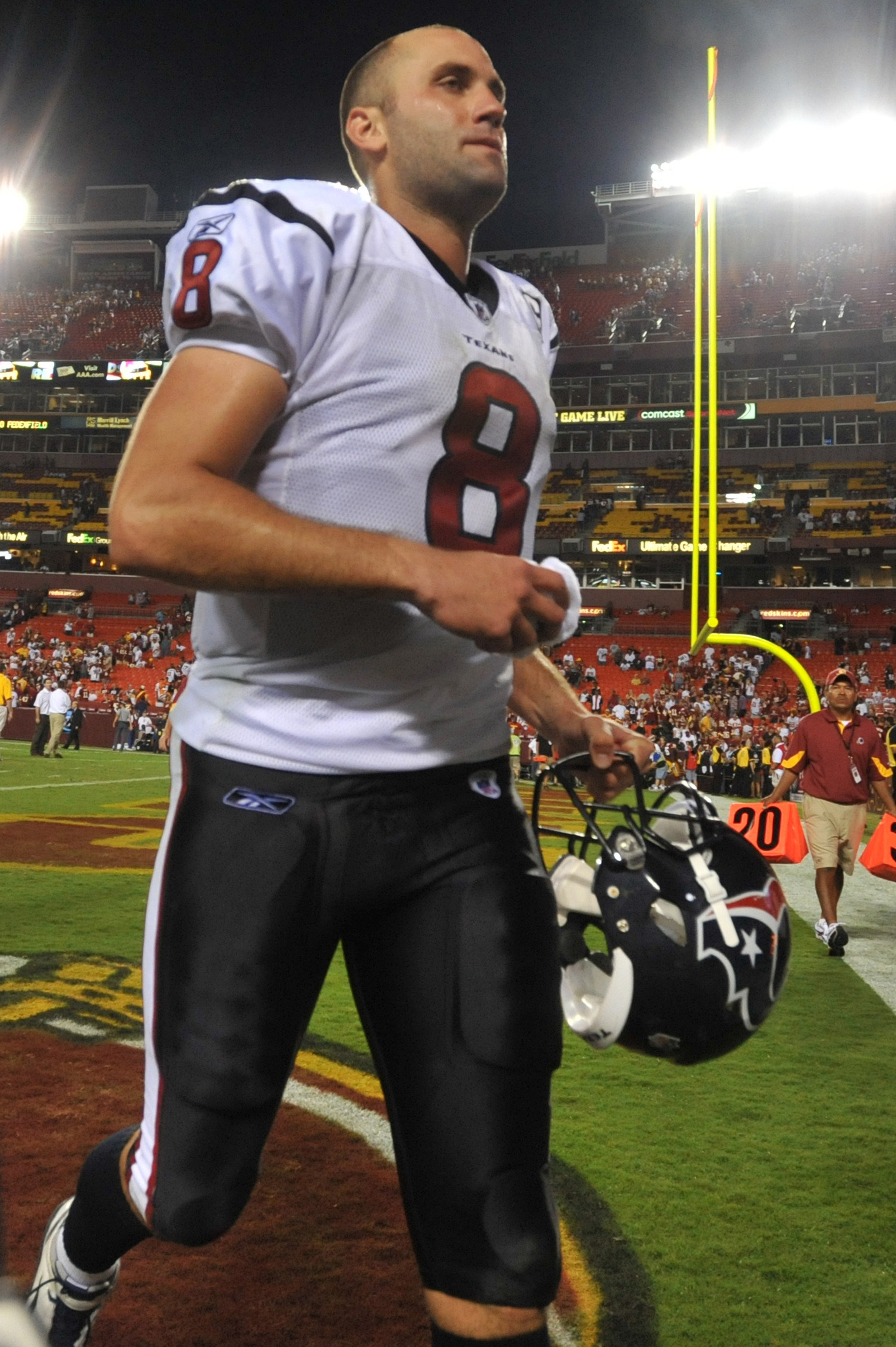 LANDOVER - SEPTEMBER 19:  Matt Schaub #8 of the Houston Texans runs off the field after the game against the Washington Redskins at FedExField on September 19, 2010 in Landover, Maryland. The Texans defeated the Redskins 30-27 in overtime. (Photo by Larry
