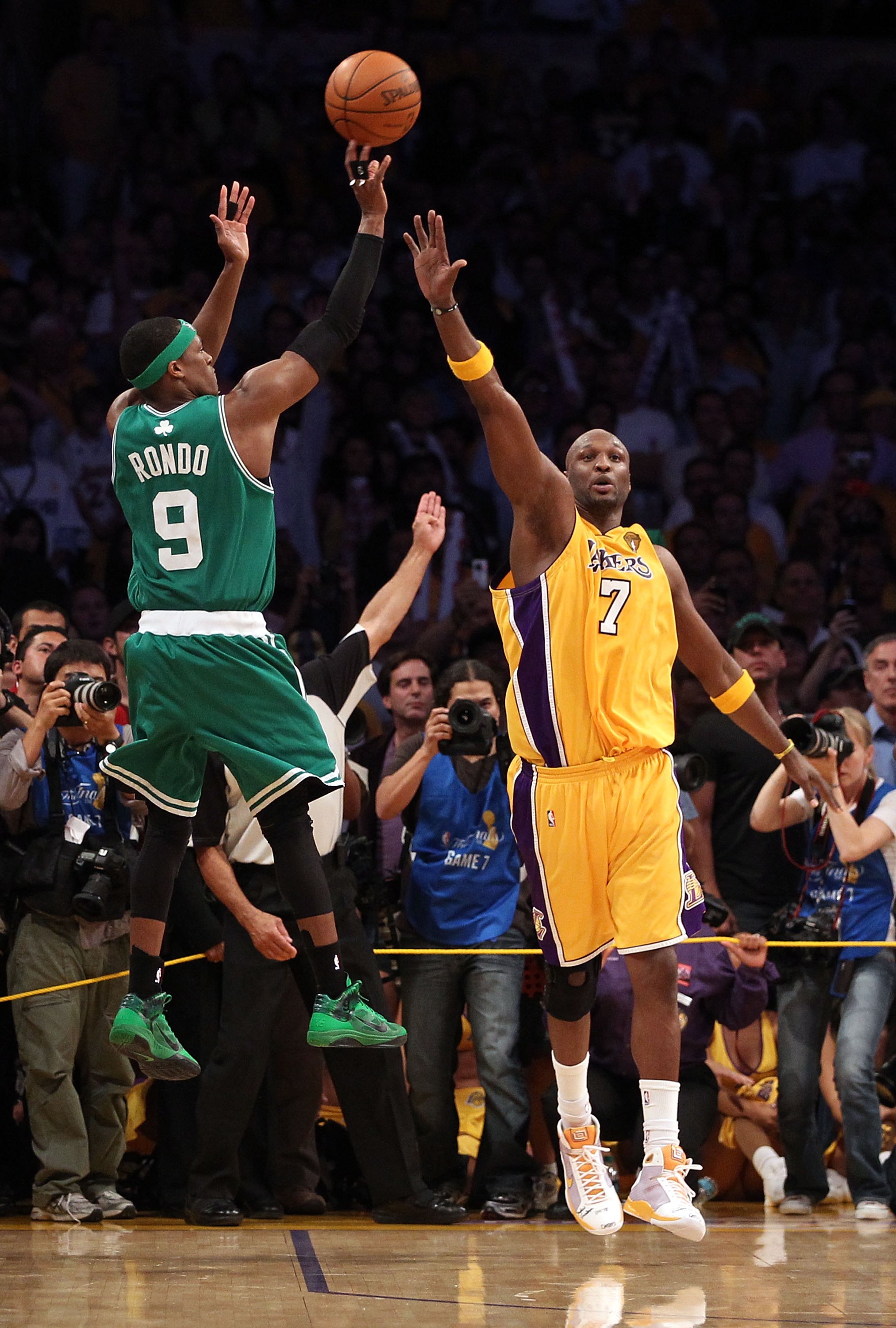 LOS ANGELES, CA - JUNE 17:  Rajon Rondo #9 of the Boston Celtics shoots a three-pointer in the final seconds over Lamar Odom #7 of the Los Angeles Lakers before the Celtics loss to the Los Angeles Lakers in Game Seven of the 2010 NBA Finals at Staples Cen