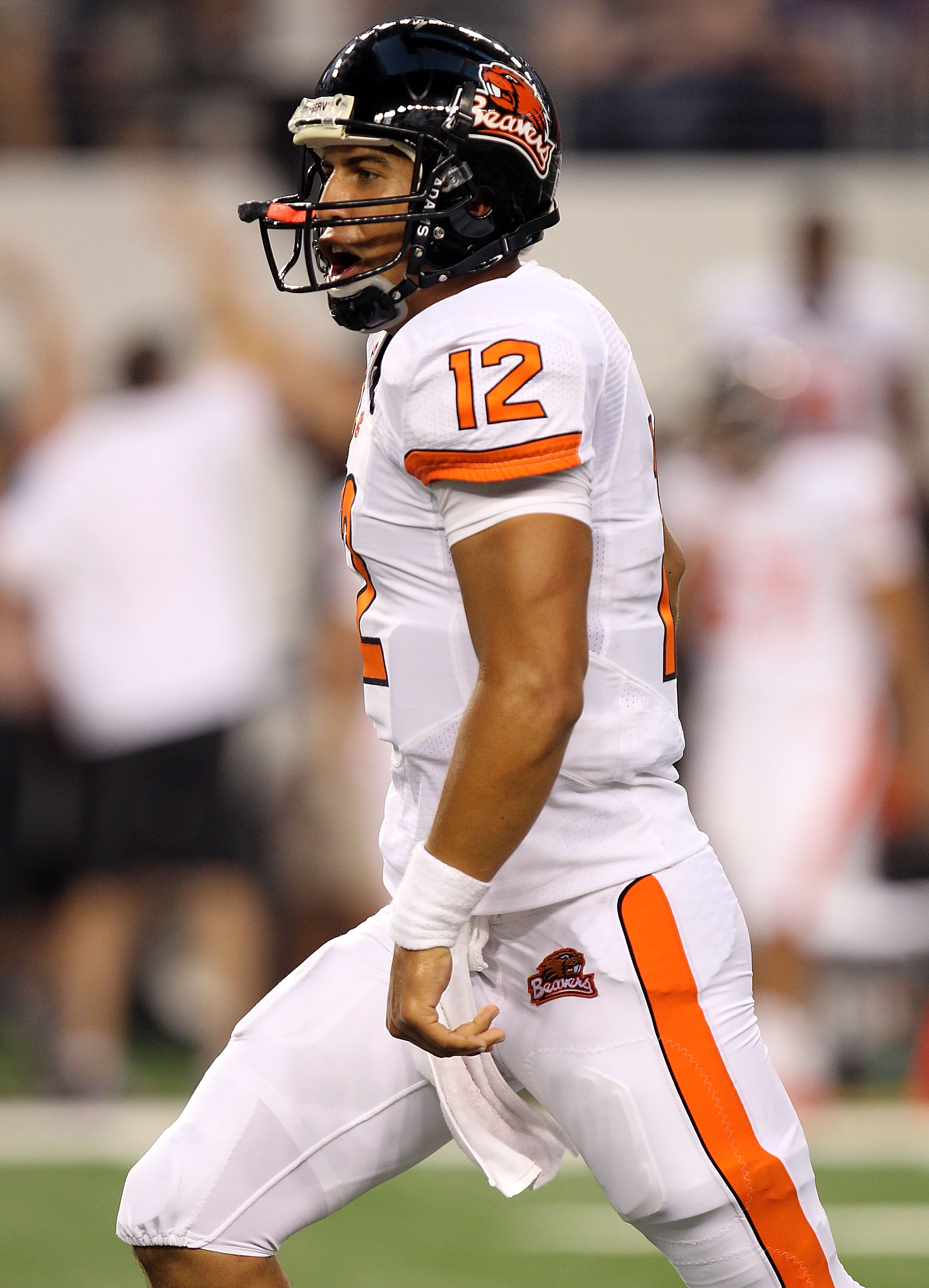 ARLINGTON, TX - SEPTEMBER 04: Quarterback Ryan Katz #12 of the Oregon State Beavers celebrates a touchdown against the TCU Horned Frogs in the second quarter at Cowboys Stadium on September 4, 2010 in Arlington, Texas. (Photo by Ronald Martinez/Getty Im