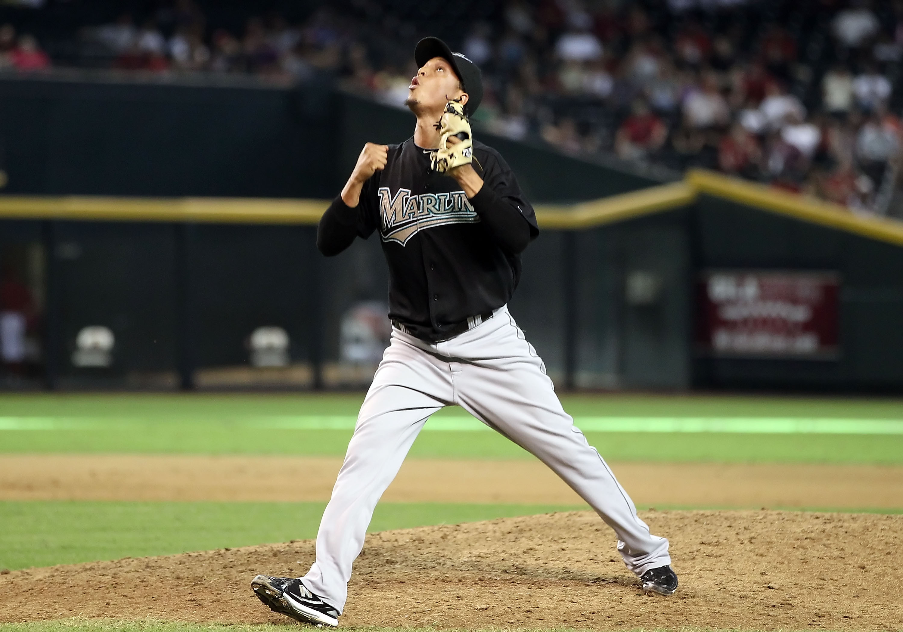 PHOENIX - JULY 11:  Relief pitcher Leo Nunez #46 of the Florida Marlins celebrates after defeating the Arizona Diamondbacks in the Major League Baseball game at Chase Field on July 11, 2010 in Phoenix, Arizona.  The Marlins defeated the Diamondbacks 2-0. 