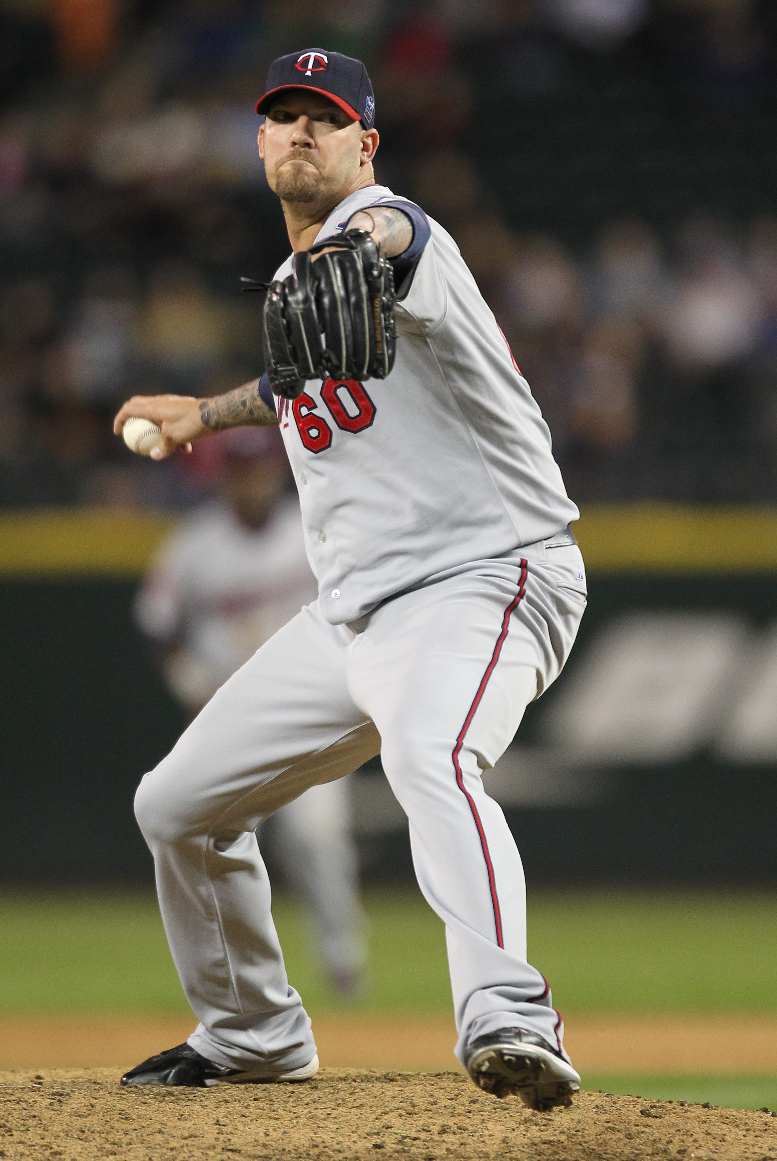 SEATTLE - AUGUST 27:  Relief pitcher Jon Rauch #60 of the Minnesota Twins pitches against the Seattle Mariners at Safeco Field on August 27, 2010 in Seattle, Washington. The Twins won 6-3. (Photo by Otto Greule Jr/Getty Images)