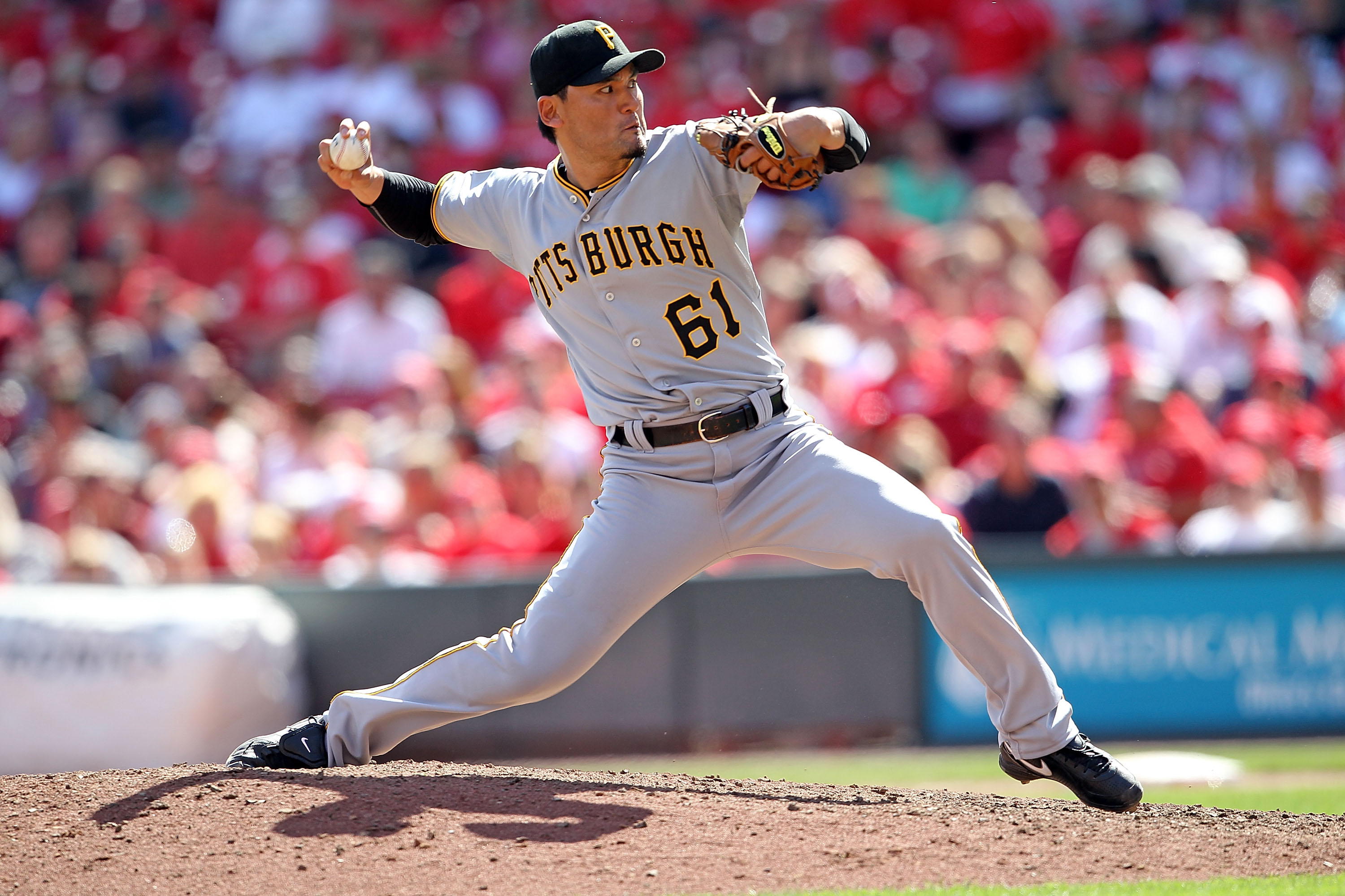 CINCINNATI - SEPTEMBER 12:  Chan Ho Park #61 of the Pittsburgh Pirates throws a pitch during the game against the Cincinnati Reds at Great American Ballpark on September 12, 2010 in Cincinnati, Ohio.  (Photo by Andy Lyons/Getty Images)