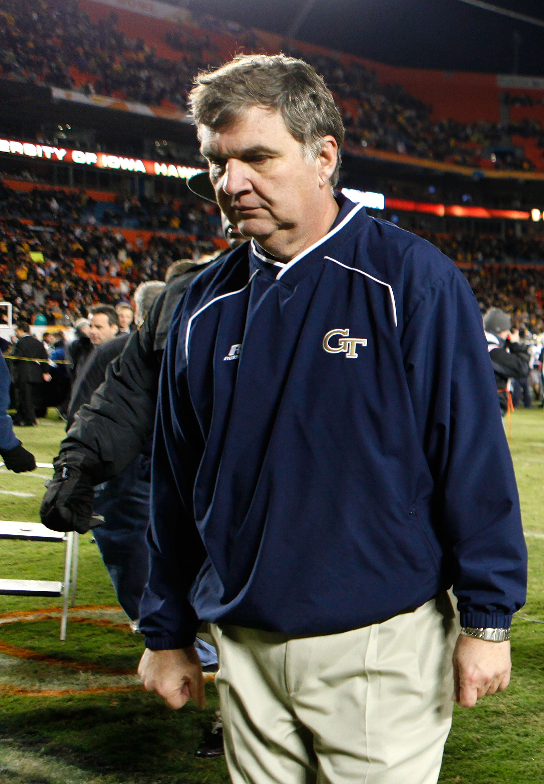 MIAMI GARDENS, FL - JANUARY 05: Head coach Paul Johnson of the Georgia Tech Yellow Jackets walks off the field dejected after they lost 24-14 against the Iowa Hawkeyes during the FedEx Orange Bowl at Land Shark Stadium on January 5, 2010 in Miami Gardens