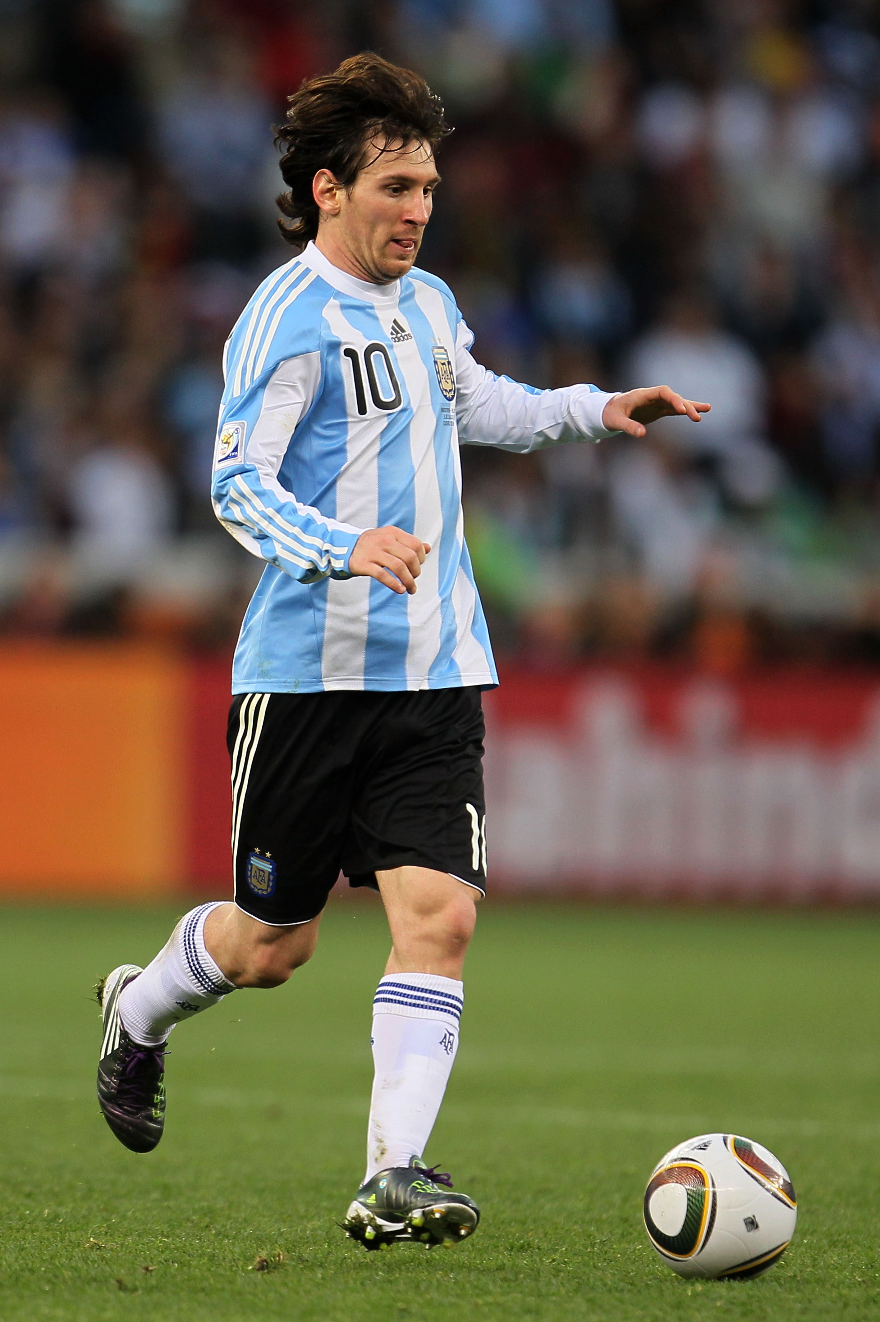 CAPE TOWN, SOUTH AFRICA - JULY 03:  Lionel Messi of Argentina in action during the 2010 FIFA World Cup South Africa Quarter Final match between Argentina and Germany at Green Point Stadium on July 3, 2010 in Cape Town, South Africa.  (Photo by Chris McGra